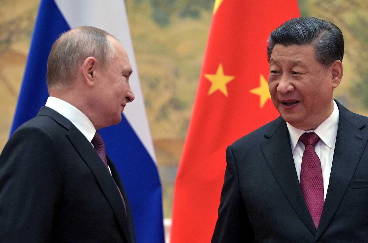 Russian President Vladimir Putin attends a meeting with Chinese President Xi Jinping in Beijing, China, Feb 4, 2022. Photo: Reuters