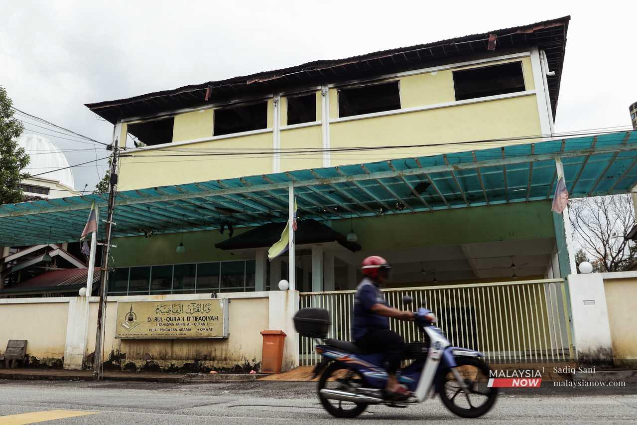 Traces of the fire can still be seen on the temporary building used by the students while the new centre was being renovated. 