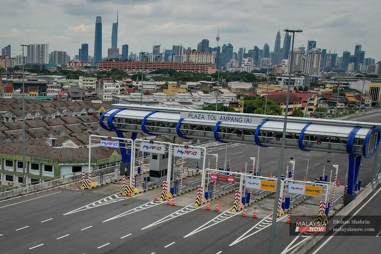 The Ampang toll plaza heading to the Kuala Lumpur City Centre.
