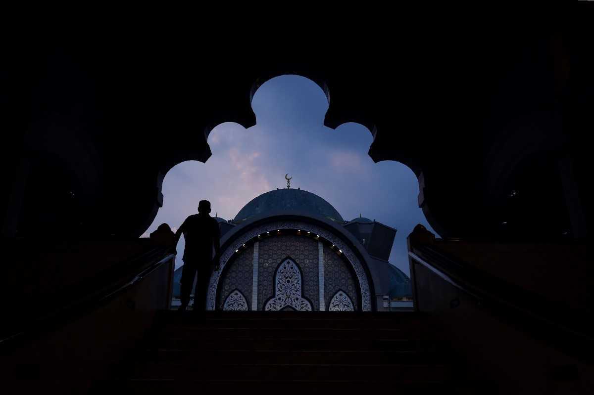 A man arrives to pray at a mosque in Kuala Lumpur in this file picture. Photo: AFP