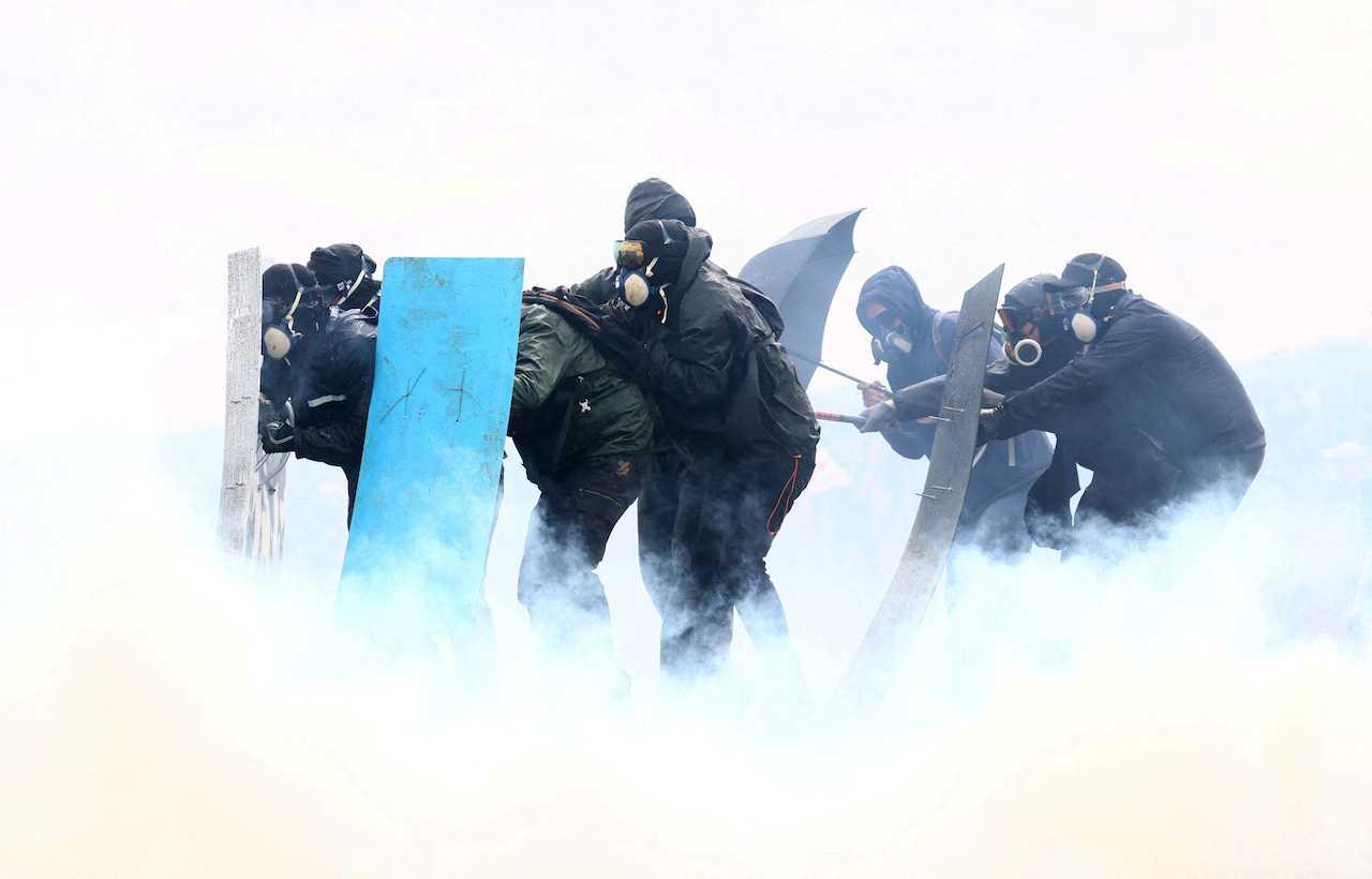 Protesters attend a demonstration against the 'basins' on the construction site of new water storage infrastructure for agricultural irrigation in western France, in Sainte-Soline, France, March 25. Photo: Reuters