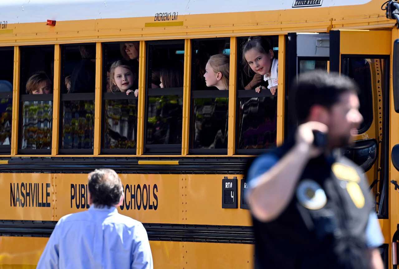 Students from The Covenant School wait to get off a bus to meet their parents at the reunification site following a mass shooting at the school in Nashville, Tennessee, March 27. Photo: Reuters