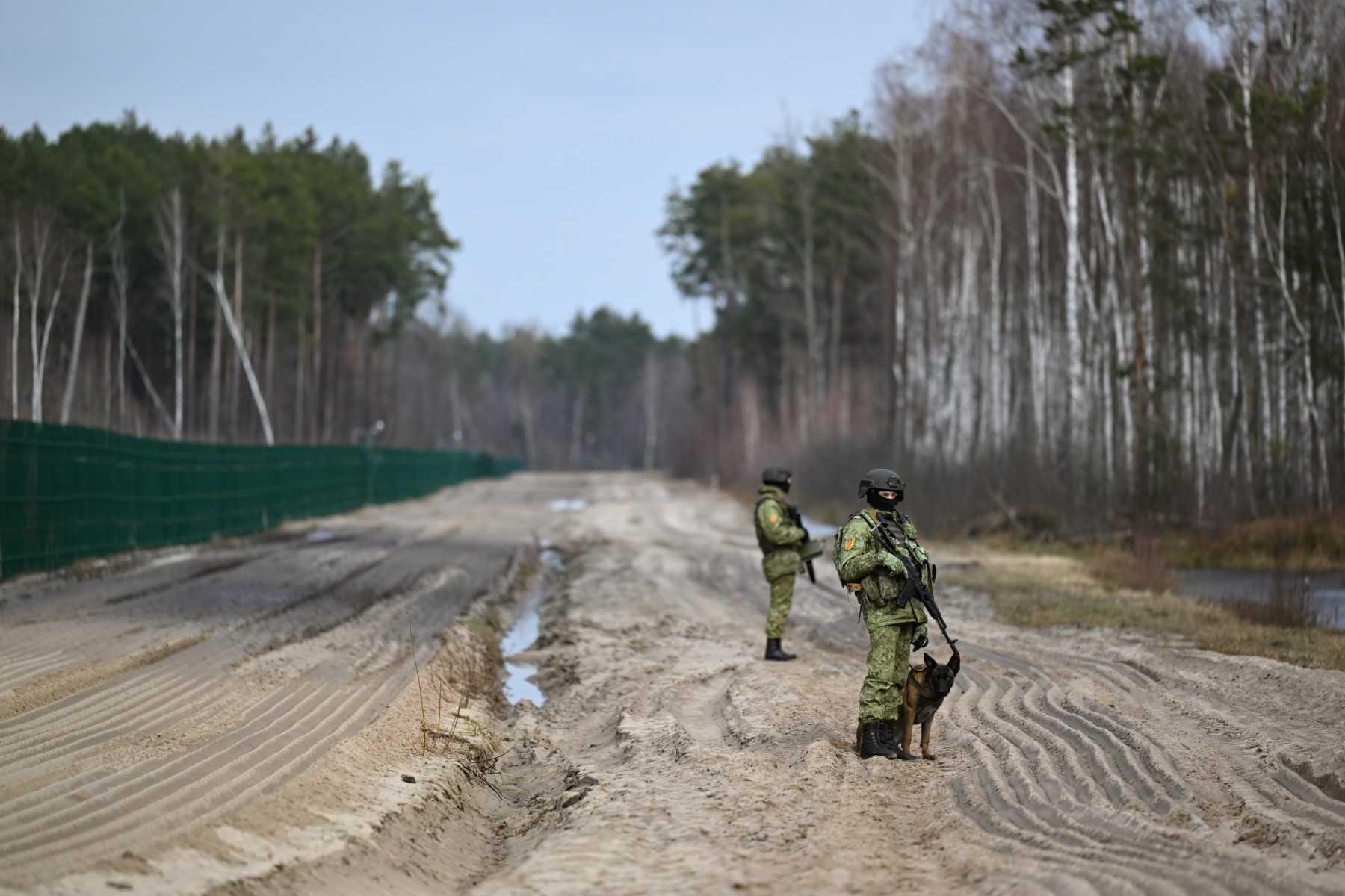 Belarusian border guards patrol along the frontier near the Divin border crossing point between Belarus and Ukraine in the Brest region on Feb 15. Photo: AFP 
