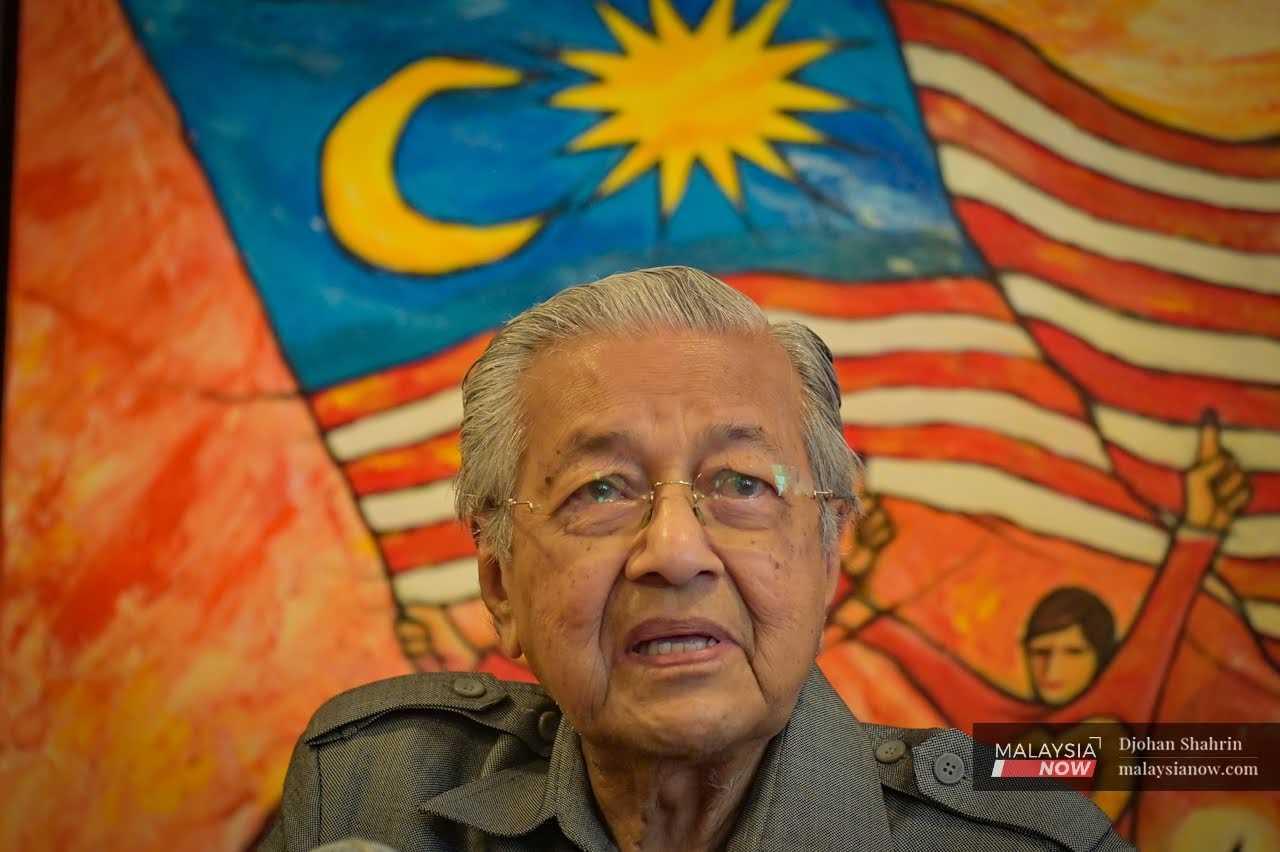 Former prime minister Dr Mahathir Mohamad speaks at a press conference in Putrajaya, March 28. 