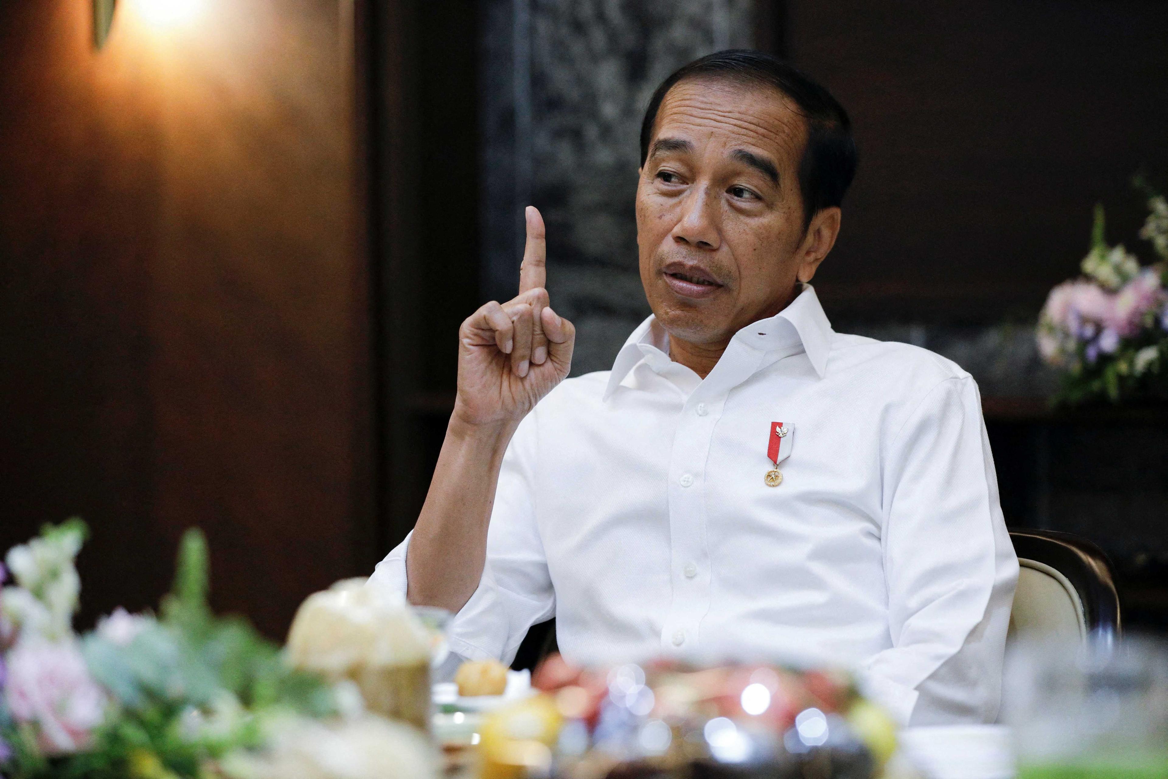 Indonesian President Joko Widodo gestures as he talks during an interview at the Presidential Palace in Jakarta, Indonesia, Feb 1. Photo: Reuters
