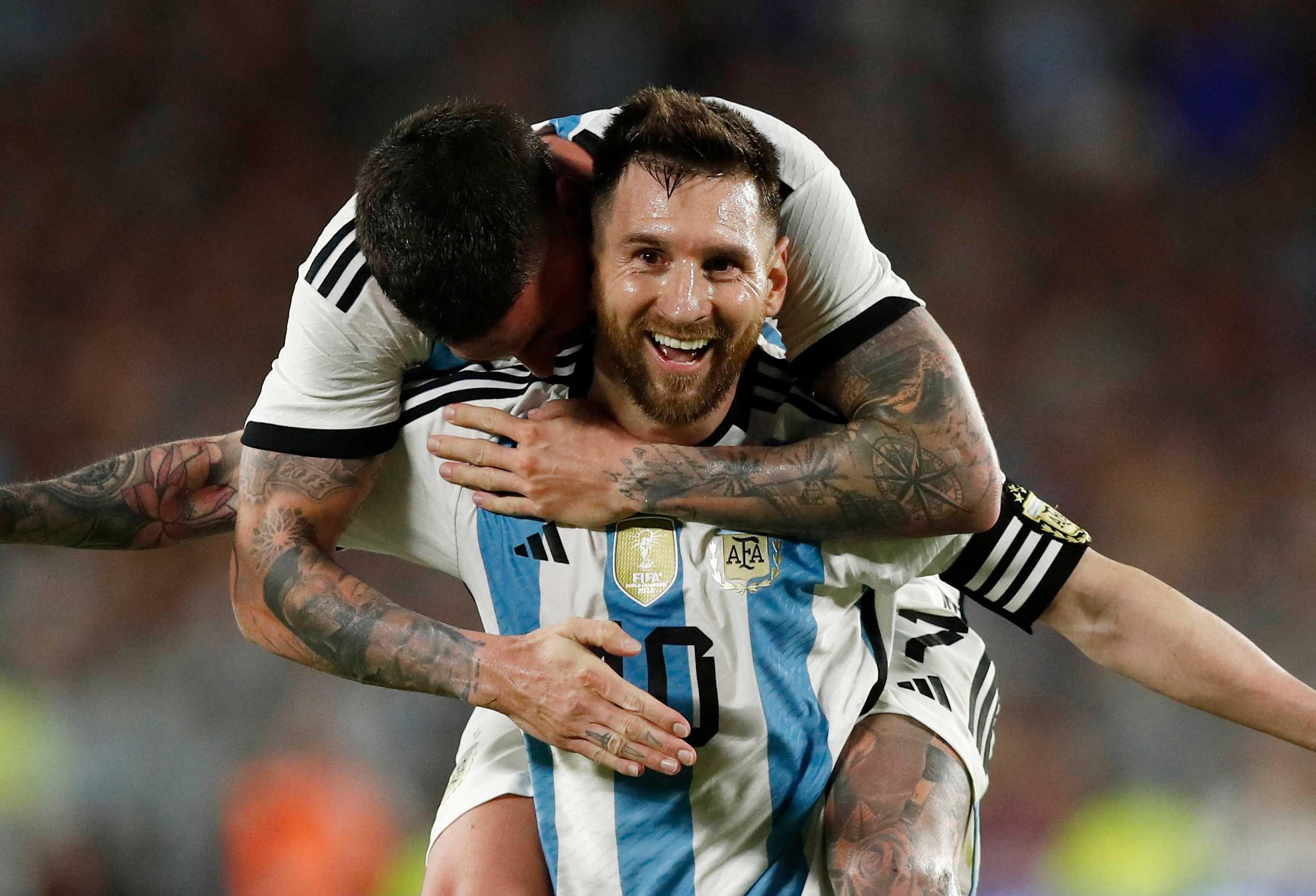 Argentina's Lionel Messi celebrates with Rodrigo De Paul after scoring their second goal, in Estadio Monumental, Buenos Aires, Argentina, March 23. Photo: Reuters