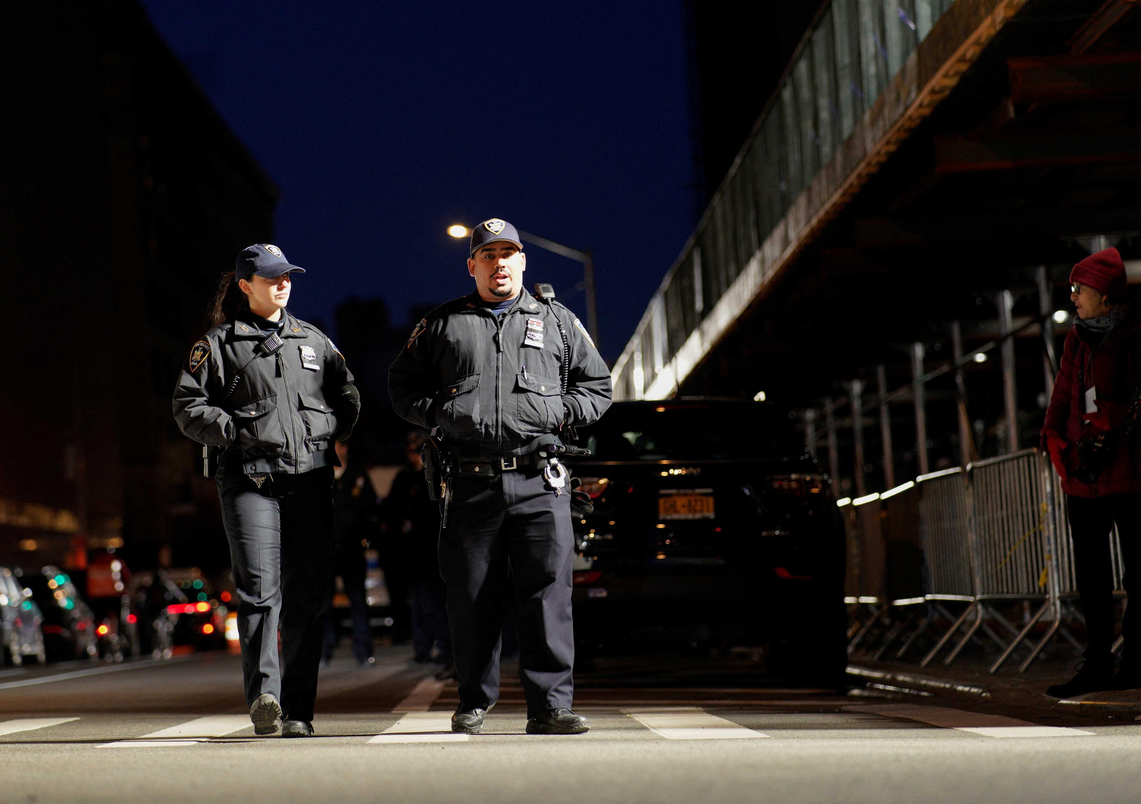 Police officers walk in New York City, US, March 30. Photo: Reuters