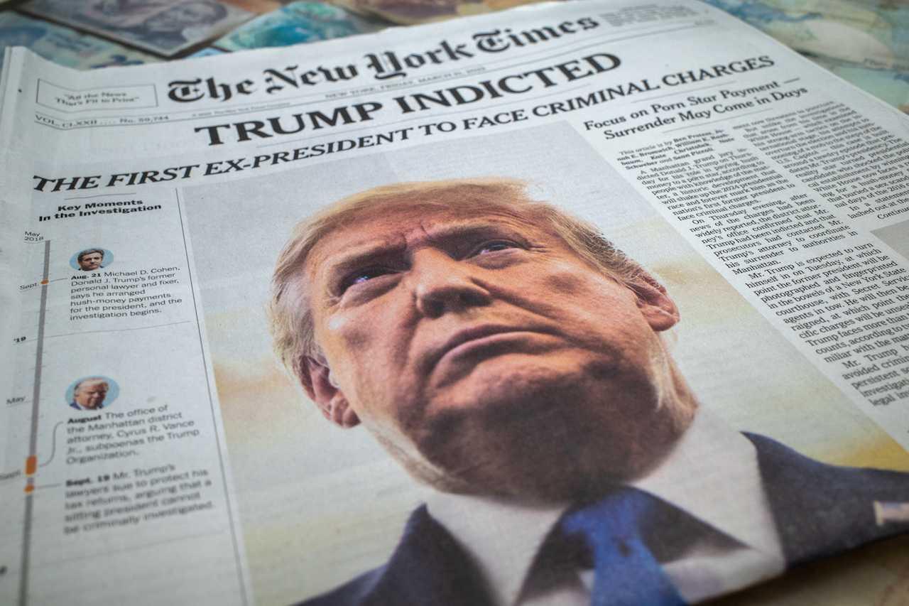 A newspaper is displayed at a newsstand after former US president Donald Trump's indictment by a Manhattan grand jury following a probe into hush money paid to porn star Stormy Daniels, in New York City, March 31. Photo: Reuters