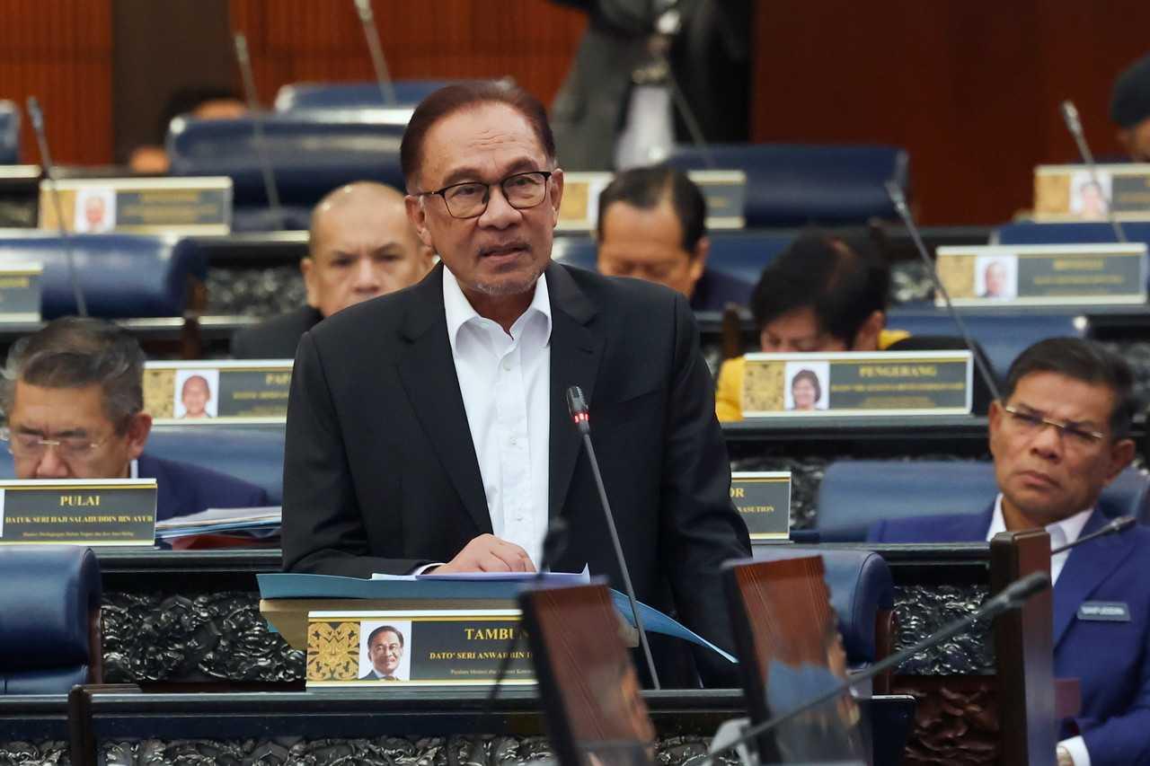 Prime Minister Anwar Ibrahim speaks during the Prime Minister's Question Time in the Dewan Rakyat, April 4. Photo: Bernama