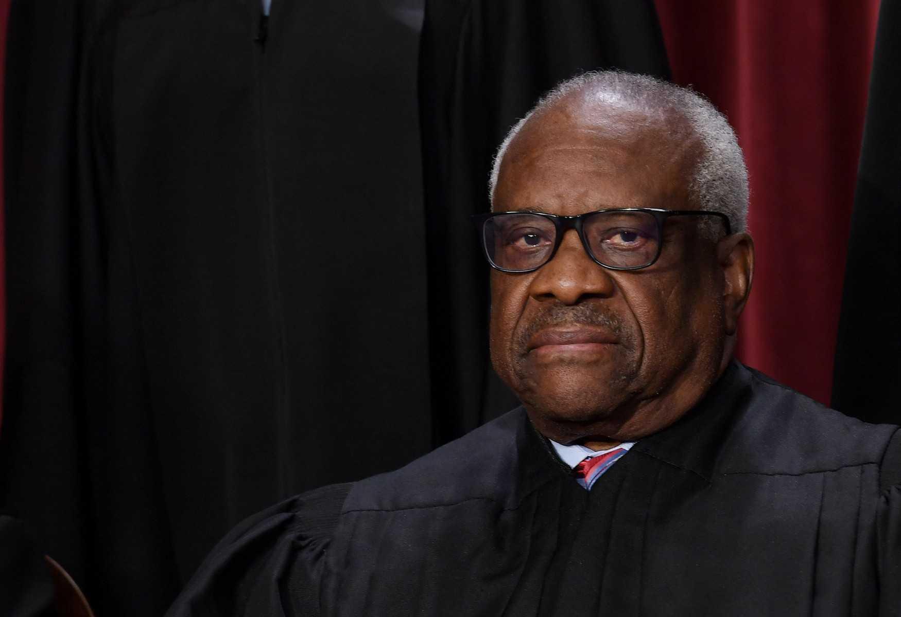 In this file photo taken on Oct 07, 2022, Associate US Supreme Court Justice Clarence Thomas poses for the official photo at the Supreme Court in Washington, DC. Photo: AFP 