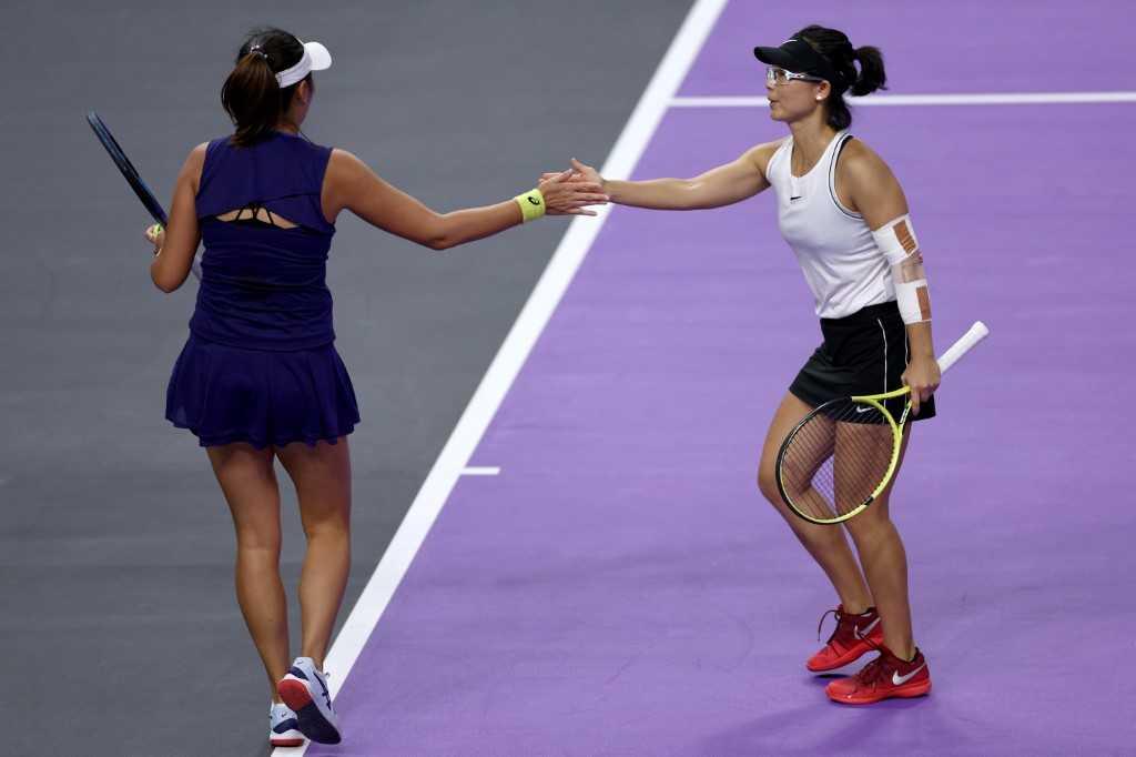 Yifan Xu and Yang Zhaoxuan of China celebrate a point against Desirae Krawczyk and Demi Schuurs in their Women's Doubles Group Stage match during the 2022 WTA Finals, part of the Hologic WTA Tour, at Dickies Arena on Nov 04, 2022 in Fort Worth, Texas. Photo: AFP 