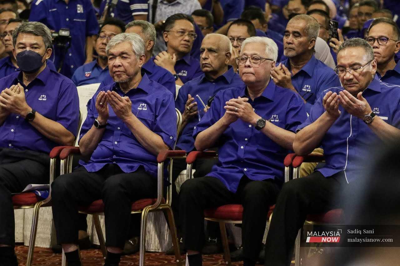 Umno vice-president Ismail Sabri Yaakob (second right) with Ahmad Zahid Hamidi and other party leaders at the time at the announcement of Barisan Nasional's candidates for the 15th general election in Kuala Lumpur, Nov 1, 2022. 
