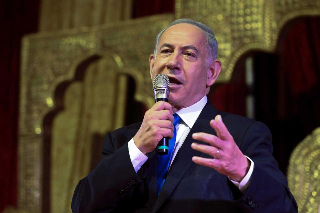 2023-04-12T205705Z_1964245681_RC28D0AS0FTN_RTRMADP_3_RELIGION-PASSOVER-NETANYAHU