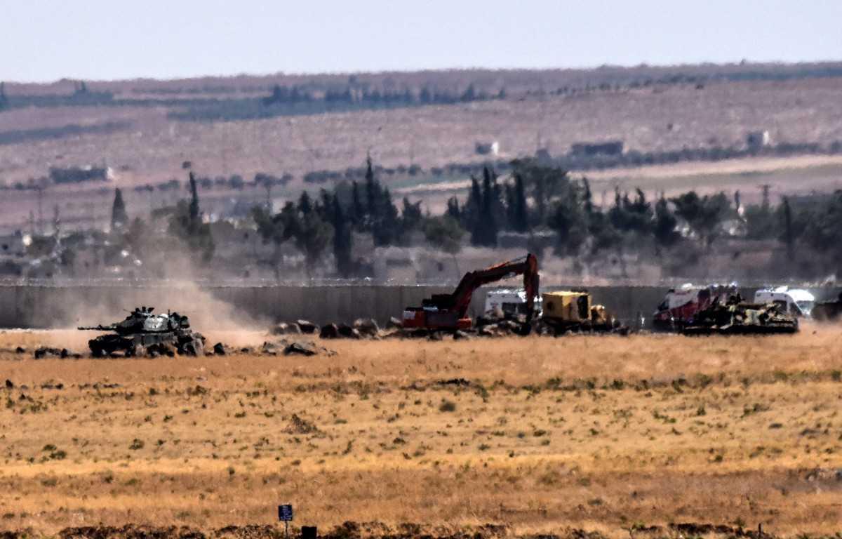 This picture taken on Sept 4, 2016 at Elbeyli, in the southern region of Kilis, shows Turkish tank coming from Syria during clashes between Turkish army and Isis militants. Photo: AFP