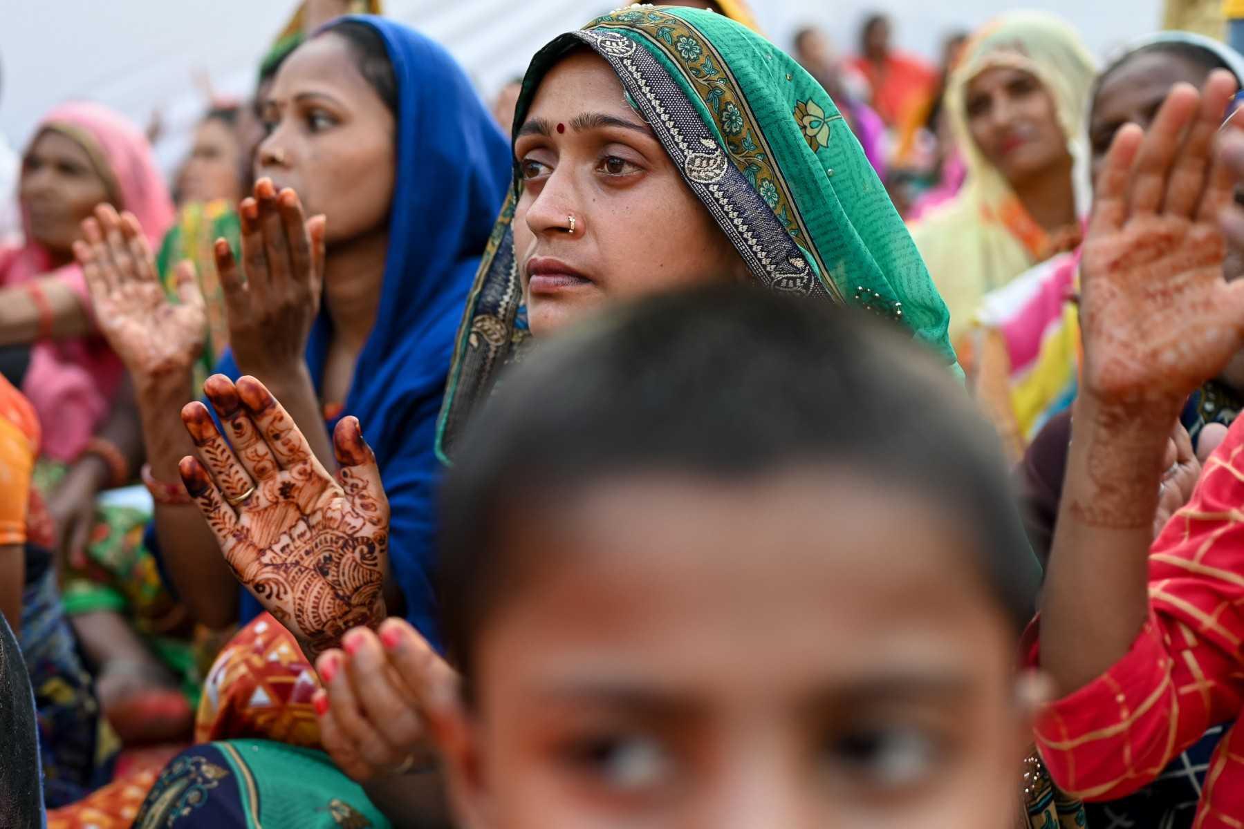 Women take part in the launch of the 'Child marriage-free India' campaign at a slum in New Delhi on Oct 16, 2022. Photo: AFP