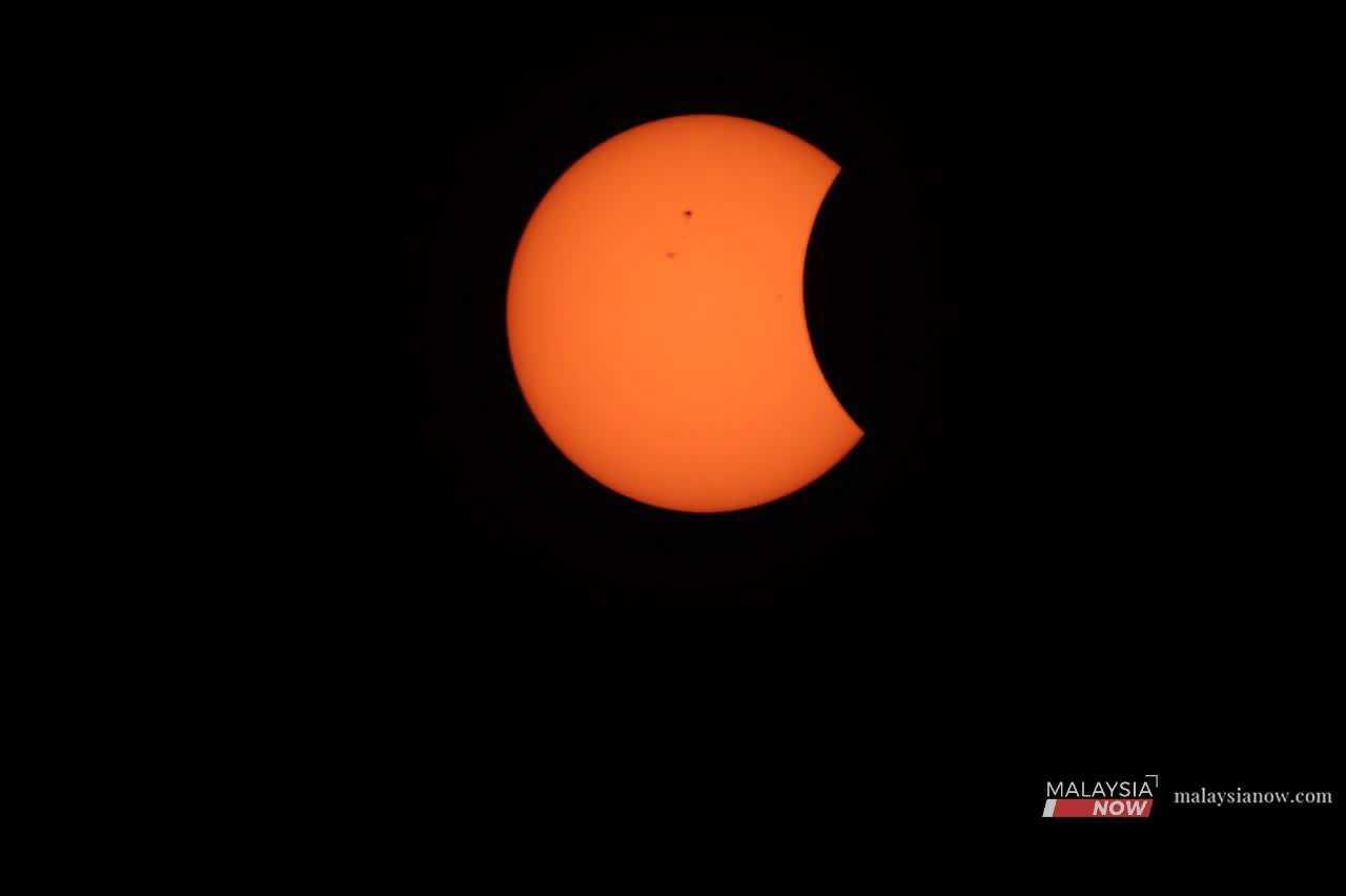 A partial solar eclipse, showing coverage of 25% to 35%, recorded by the National Planetarium team in Tawau, Sabah, at 12.01pm. Photo: National Planetarium