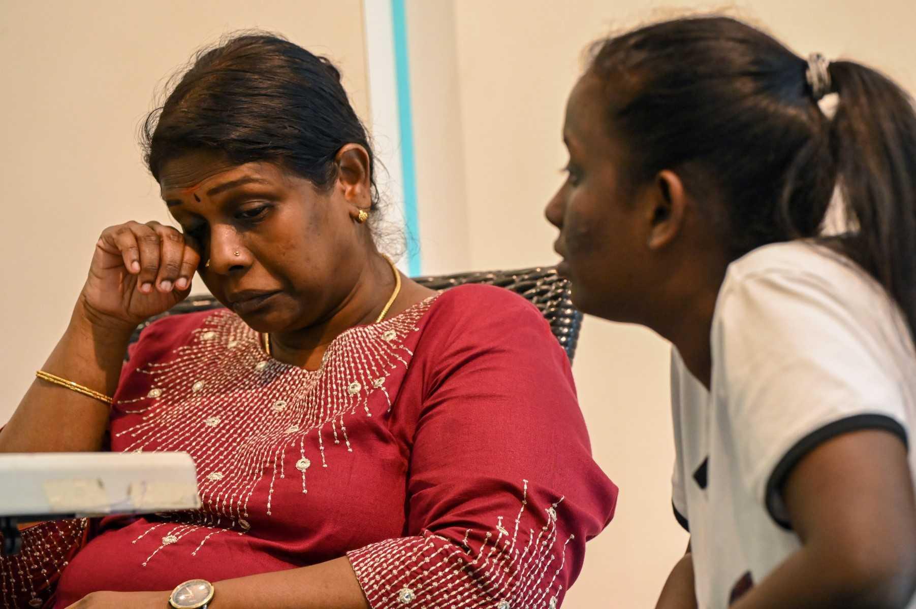 Leelavathy Suppiah (left), the sister of convicted drug trafficker Tangaraju Suppiah, who is scheduled for execution, reacts during a press conference in Singapore on April 23. Photo: AFP