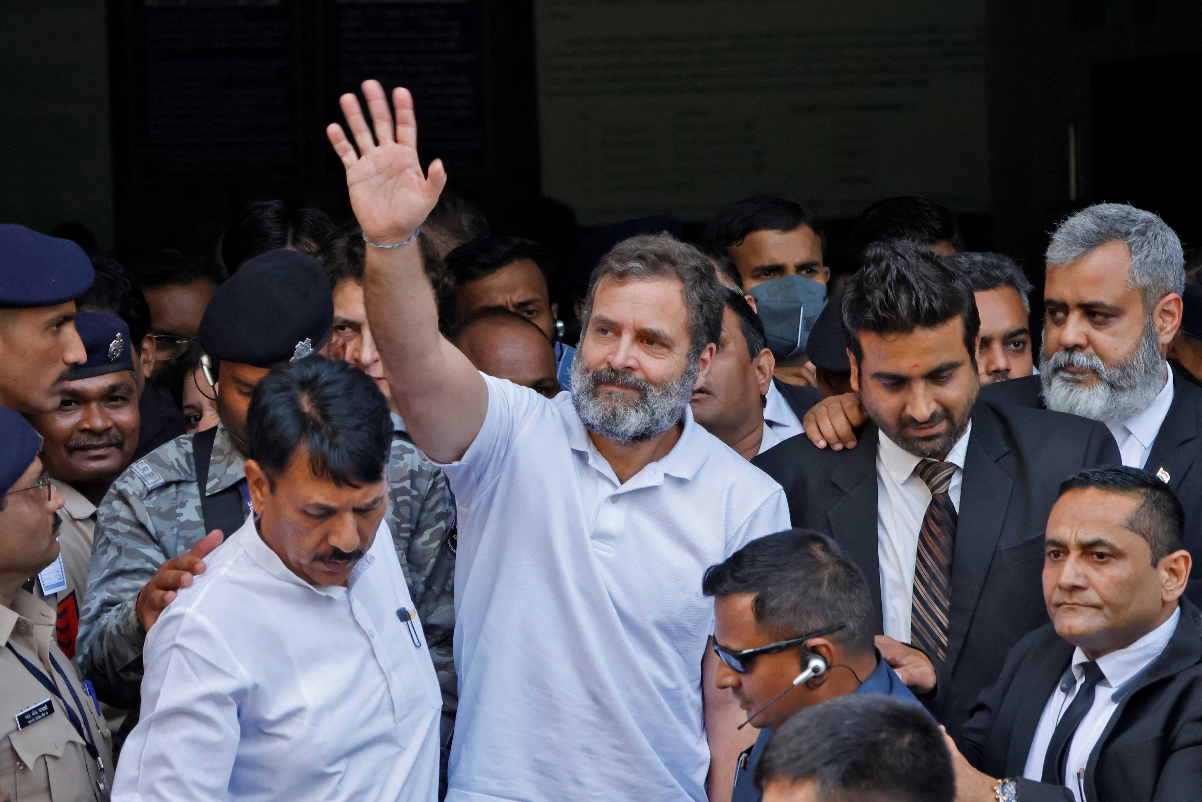 Rahul Gandhi, a senior leader of India's main opposition Congress party, waves as he leaves a court after he lodged an appeal against his conviction for defamation, in Surat in the western state of Gujarat, India, April 3. Photo: Reuters