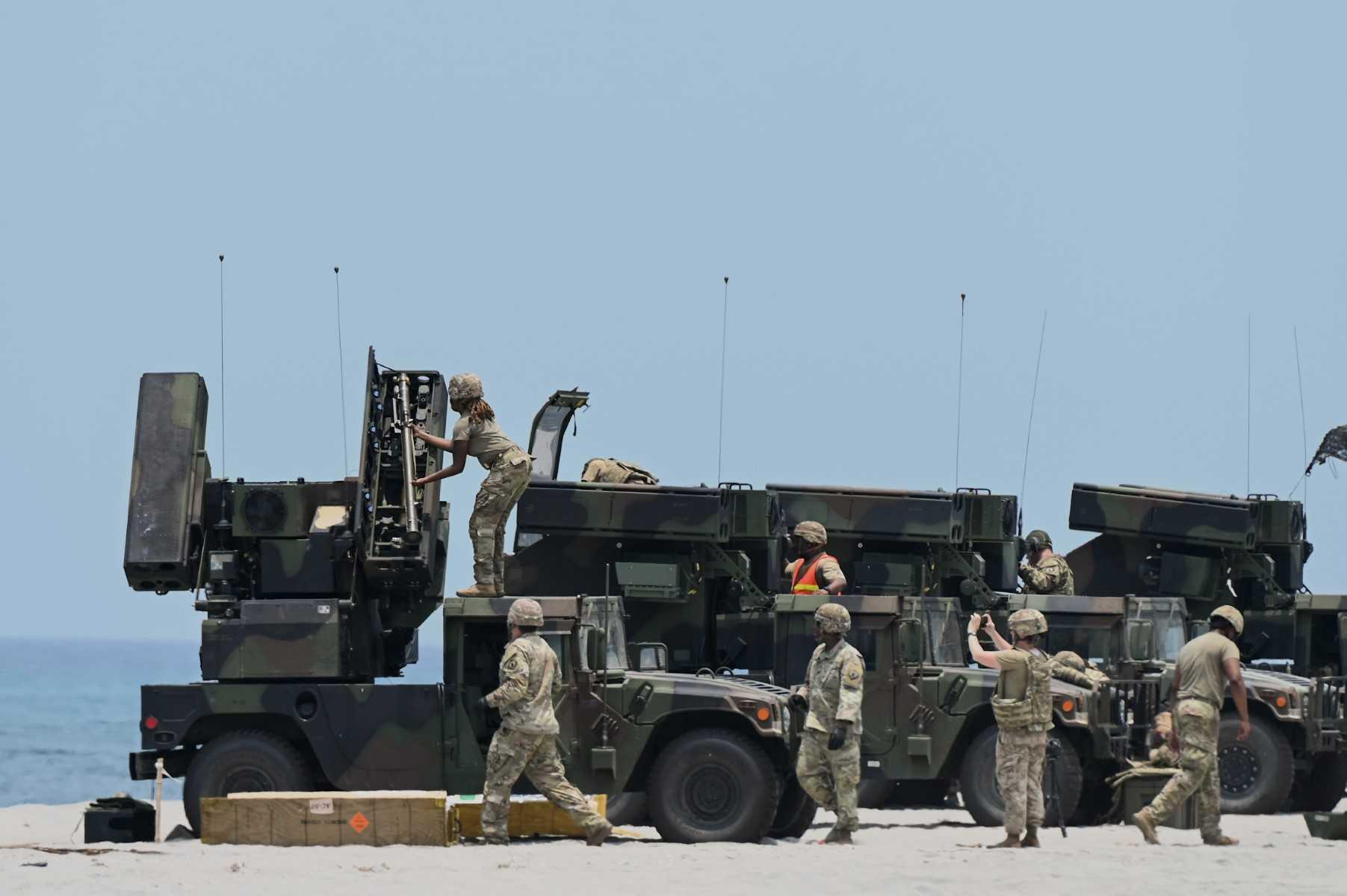 A US soldier loads an Avenger surface-to-air missile system during the US-Philippines Balikatan joint military exercise at San Antonio in Zambales, north of Manila on April 25. Photo: AFP