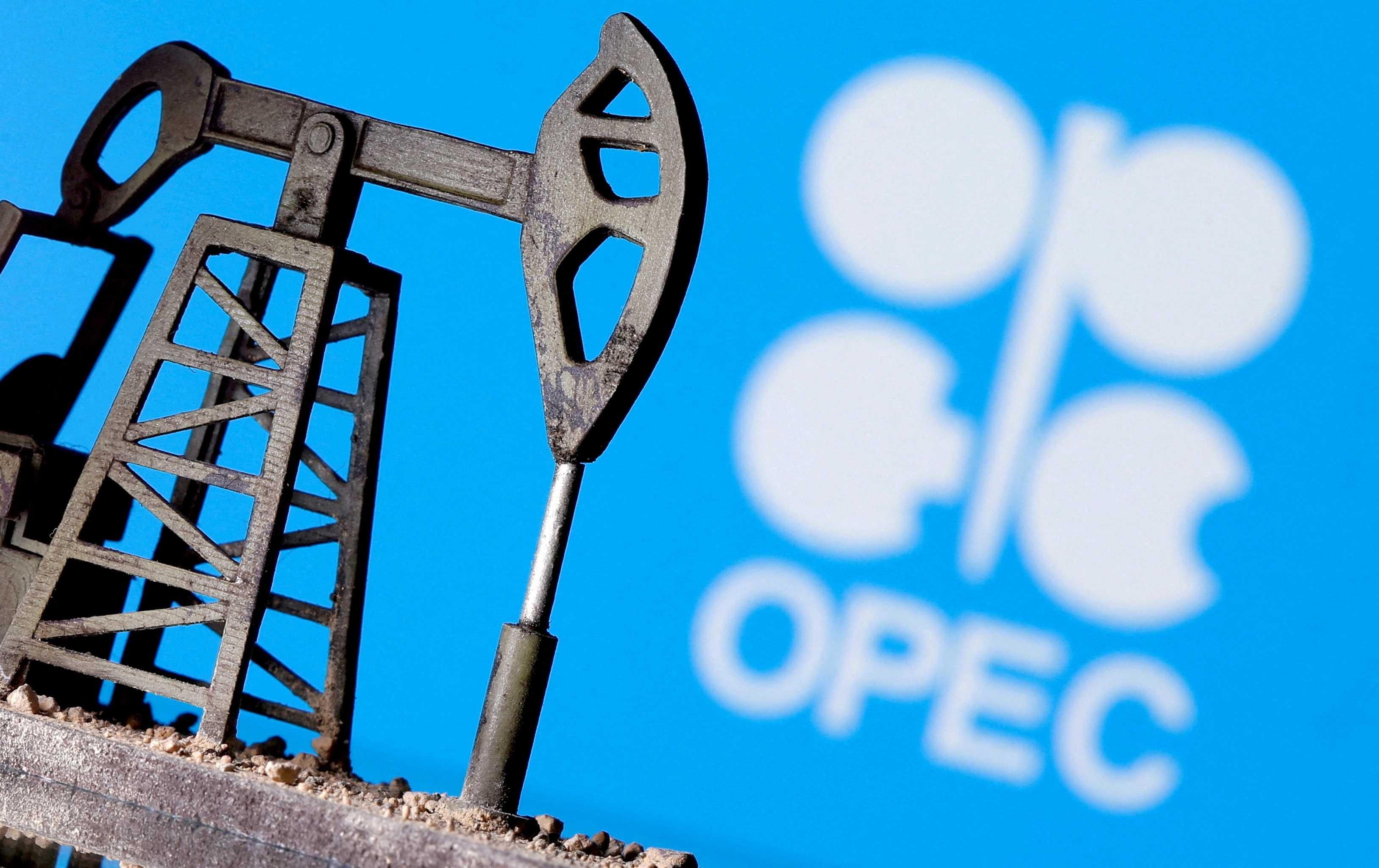 A 3D-printed oil pump jack is seen in front of displayed Opec logo in this illustration picture, April 14, 2020. Photo: Reuters