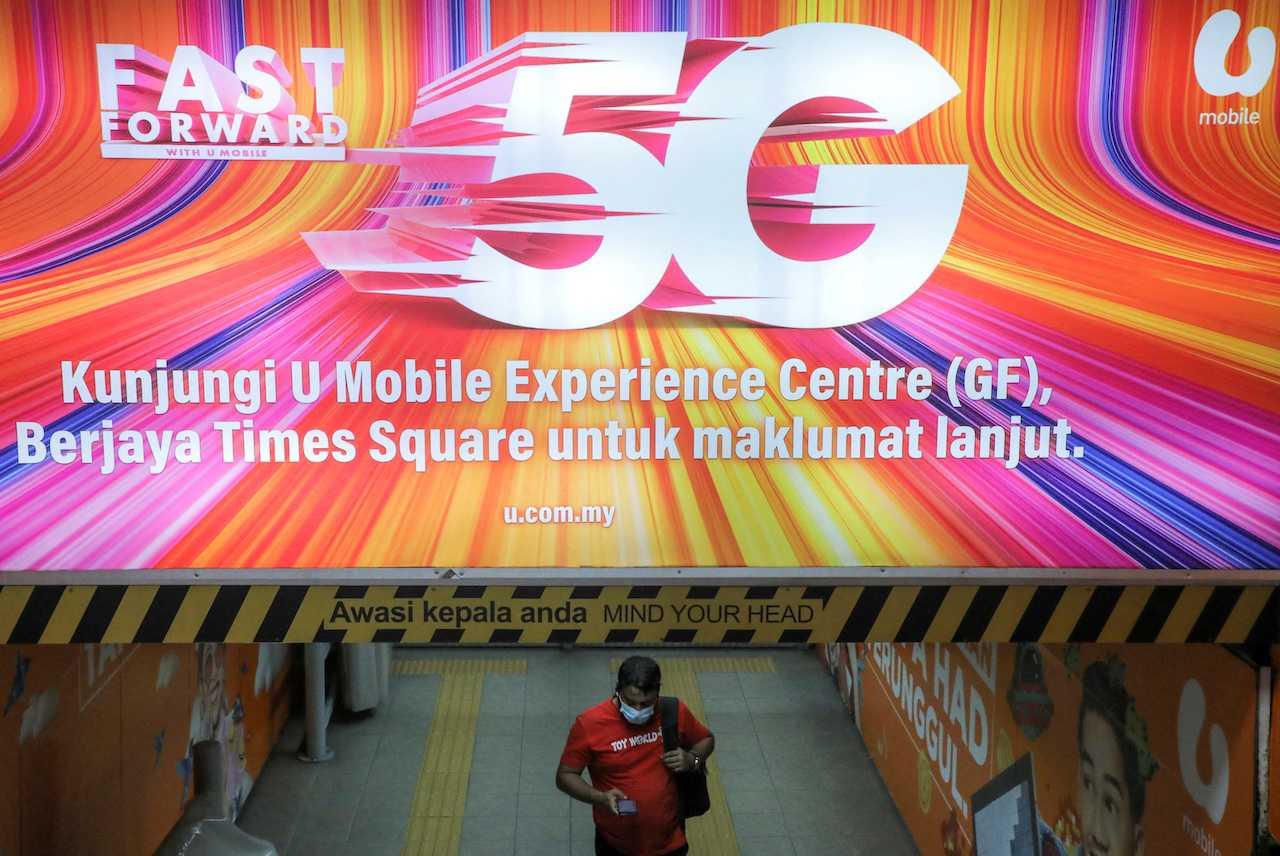 Iklan rangkaian 5G oleh U Mobile dipaparkan di Kuala Lumpur, Malaysia, 26 September 2022. Gambar: Reuters