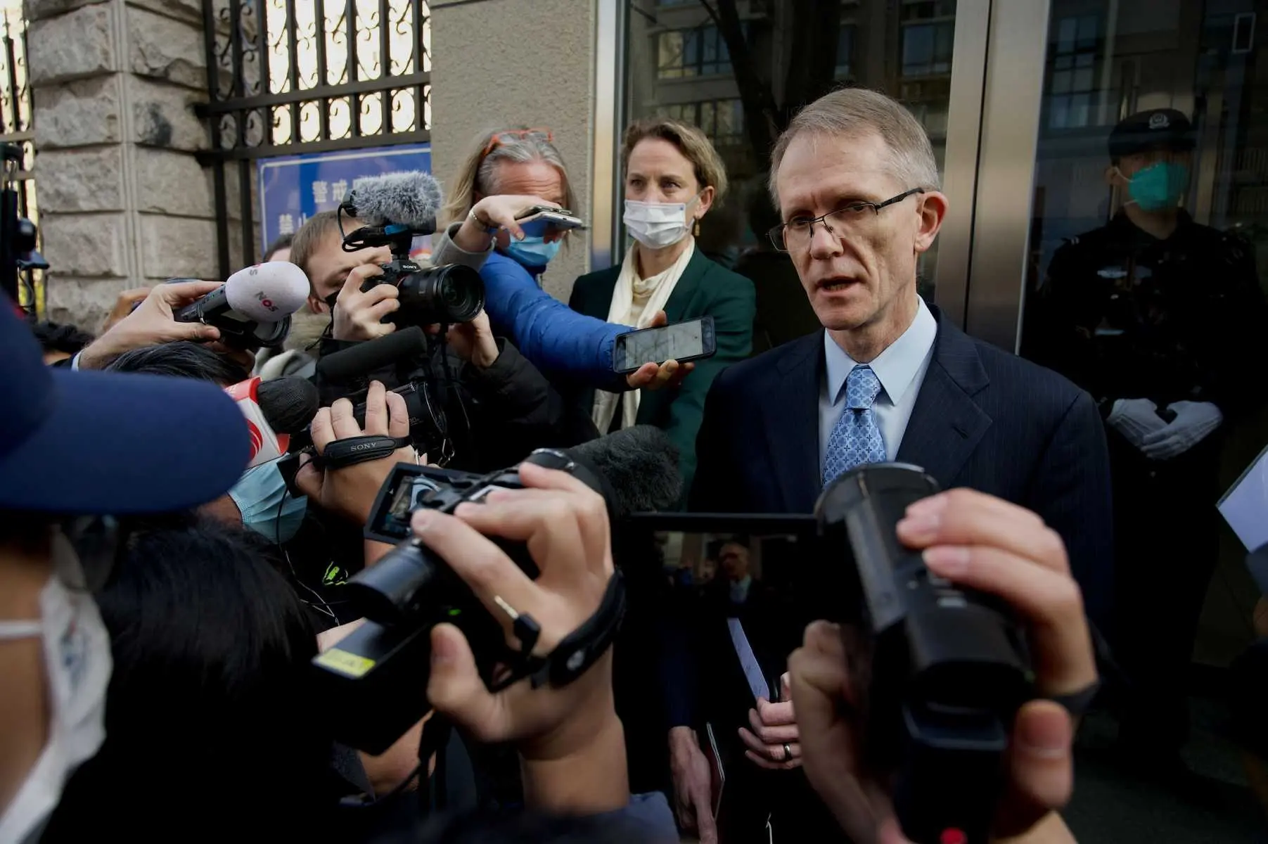 Australian Ambassador to China Graham Fletcher gives a statement to media outside the Beijing Number 2 People's Intermediate Court, where the trial of Australian journalist Cheng Lei will take place, in Beijing on March 31, 2022. Photo: AFP