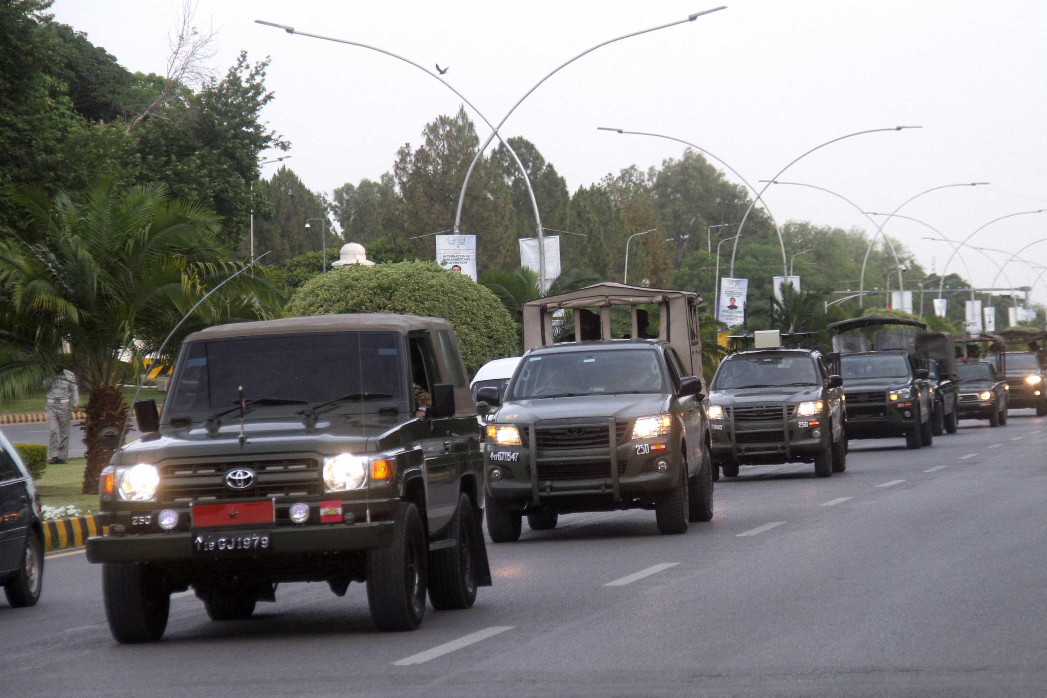 Pakistan Army vehicles patrol during a flag march, ahead of Pakistan's former Prime Minister Imran Khan's appearance in the Supreme Court in Islamabad, Pakistan May 11. Photo: Reuters