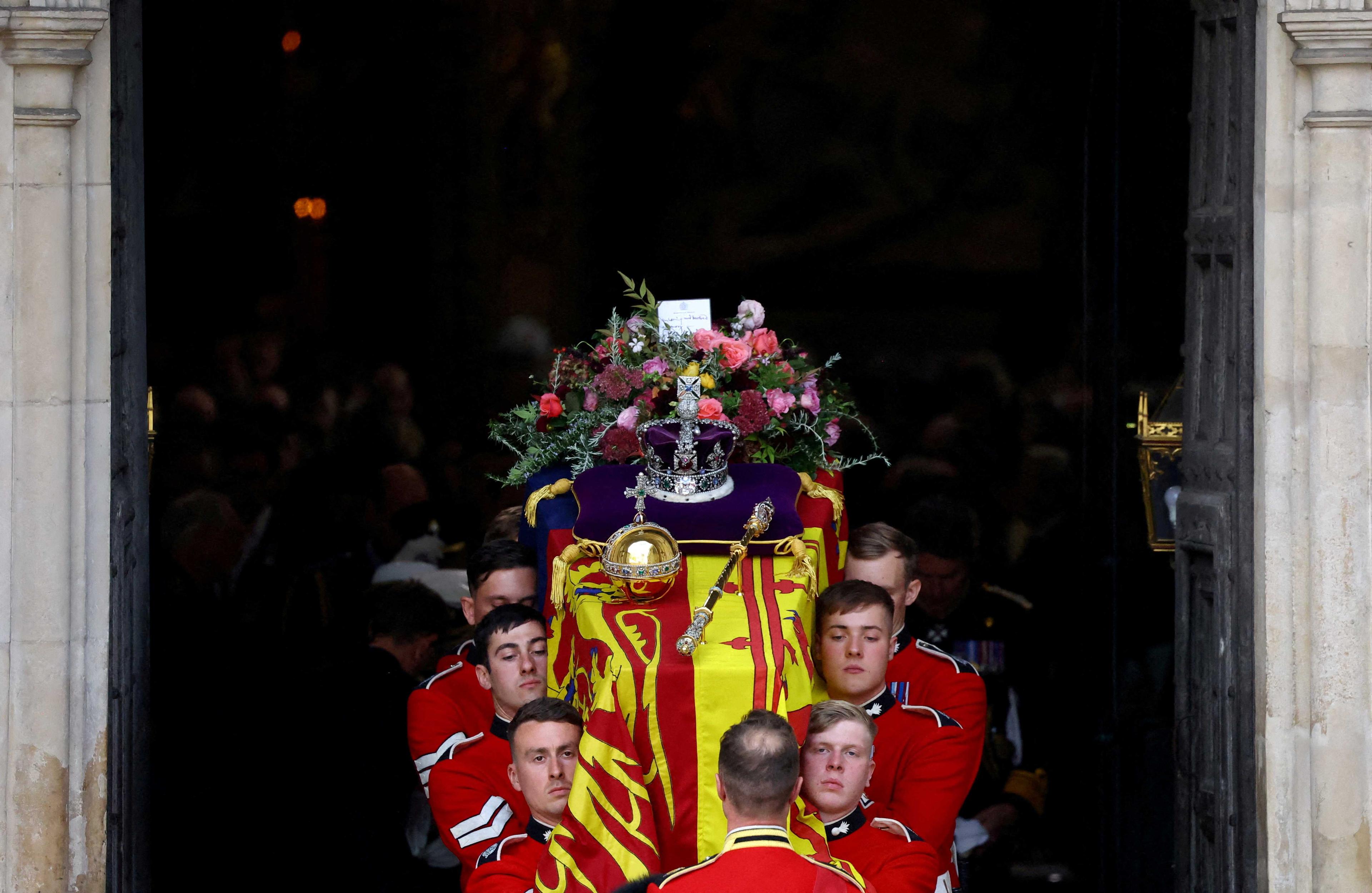 The coffin of Britain's Queen Elizabeth is carried out of Westminster Abbey after a service on the day of her state funeral and burial, in London, Britain, Sept 19, 2022. Photo: Reuters