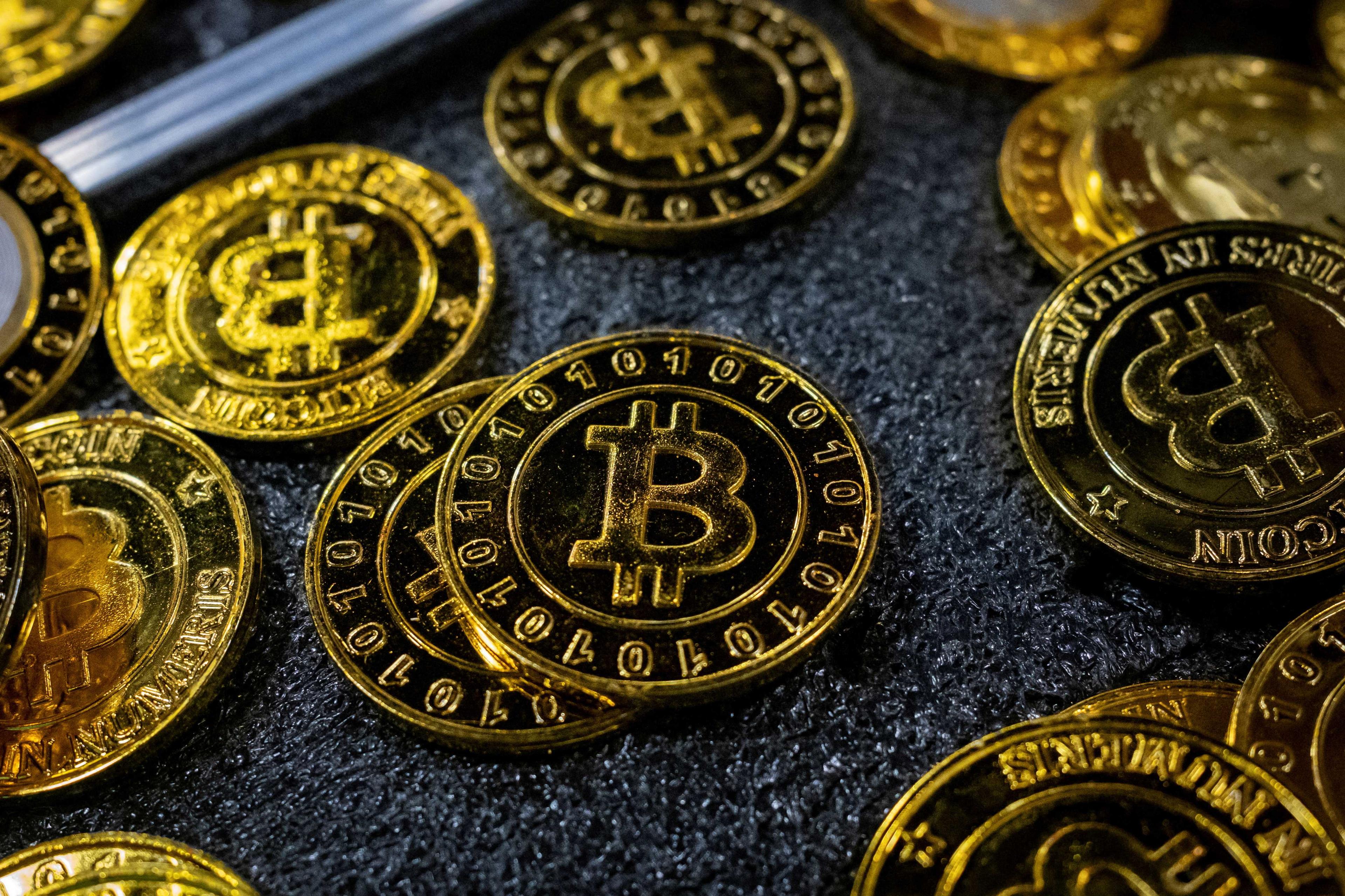 Bitcoin coins are seen at a stand during the Bitcoin Conference 2023, in Miami Beach, Florida, US, May 19. Photo: Reuters