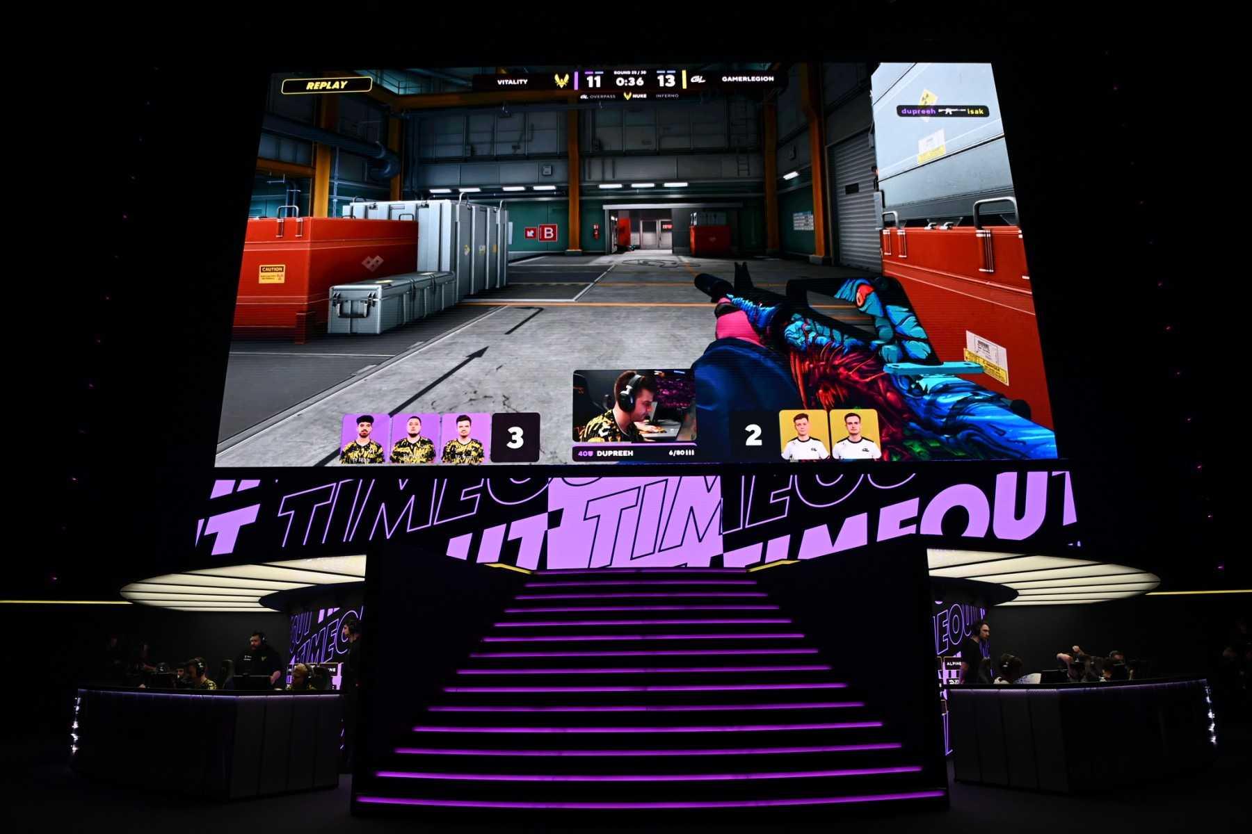 Vitality's players and GamerLegion's players compete during the 2023 Counter-Strike Global Offensive Major final between GamerLegion and Vitality at the Accor Arena Bercy in Paris on May 21. Photo: AFP