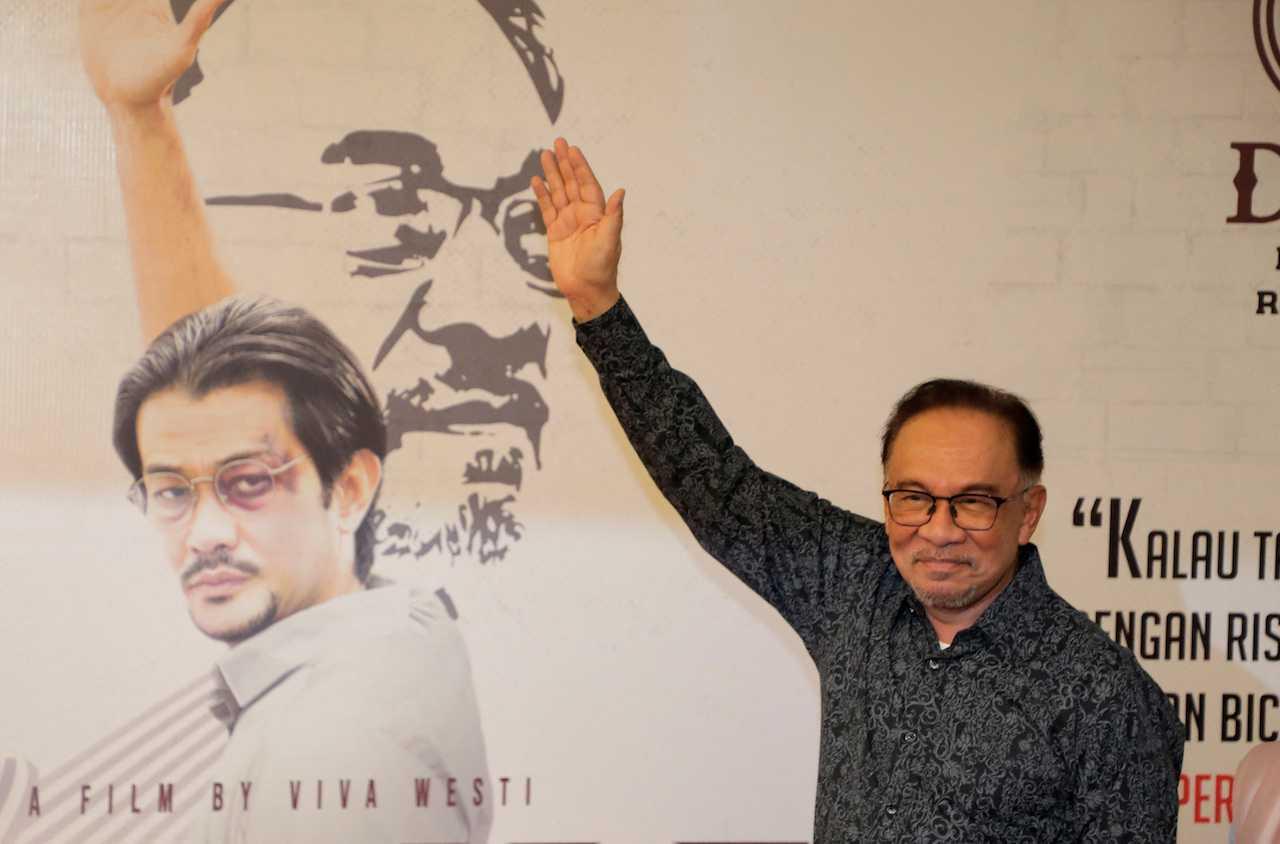 Prime Minister Anwar Ibrahim poses during a premiere show of 'Anwar: The Untold Story' in Kuala Lumpur, May 8. Photo: Reuters