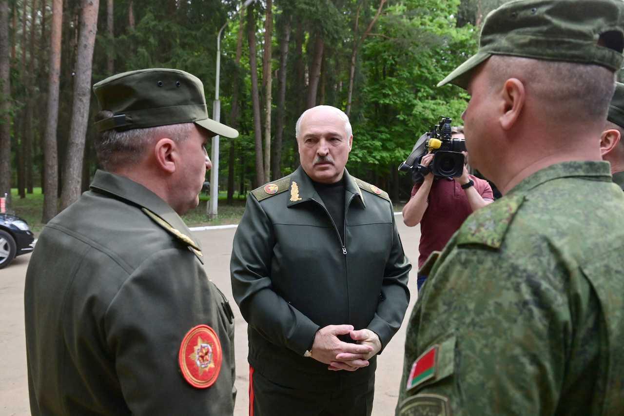 Belarusian President Alexander Lukashenko visits the central command post of the Air Force and Air Defence Forces in Minsk, Belarus, May 15. Photo: Reuters
