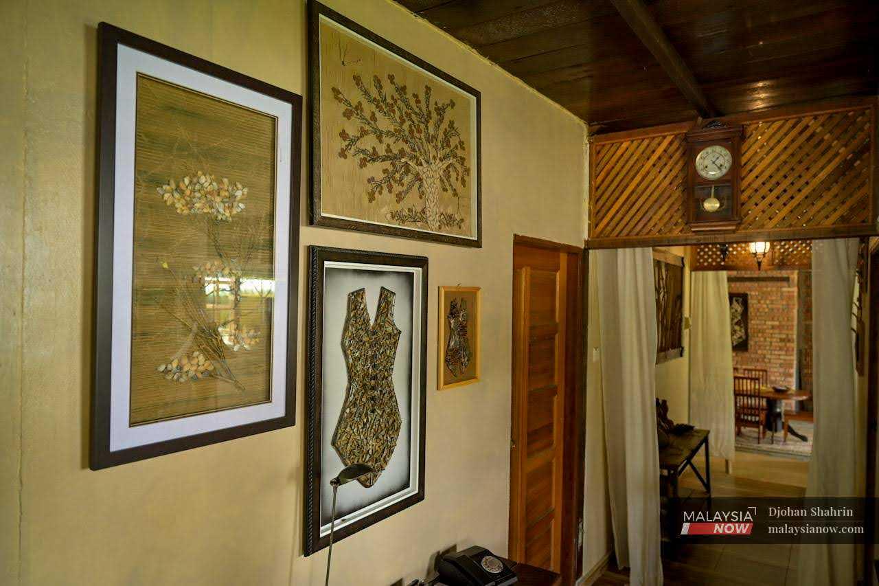 Some of their work, framed and hung on the wall of their house. 
