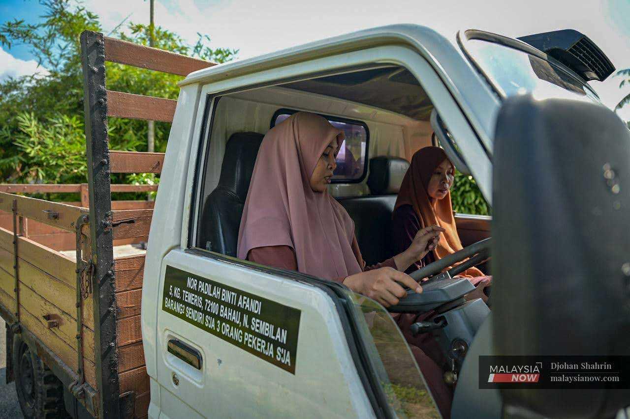 The sisters use a lorry to collect and bring home the materials they use.