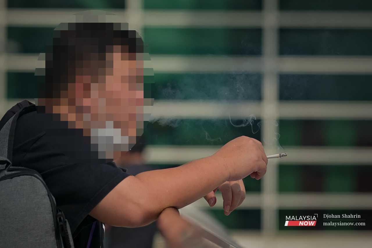 Many continue to smoke in public places despite the ban which took effect on Jan 1, 2019. 
