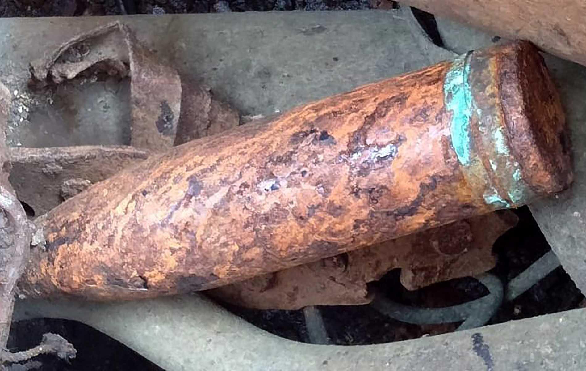This undated photo released by the Malaysian Maritime Enforcement Agency on May 30 shows an old cannon shell on a Chinese vessel after anchoring near Tanjung Siang in the waters of Johor. Photo: AFP