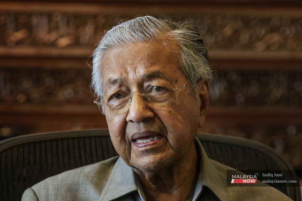 Former prime minister Dr Mahathir Mohamad speaks during an interview with MalaysiaNow in Putrajaya. 
