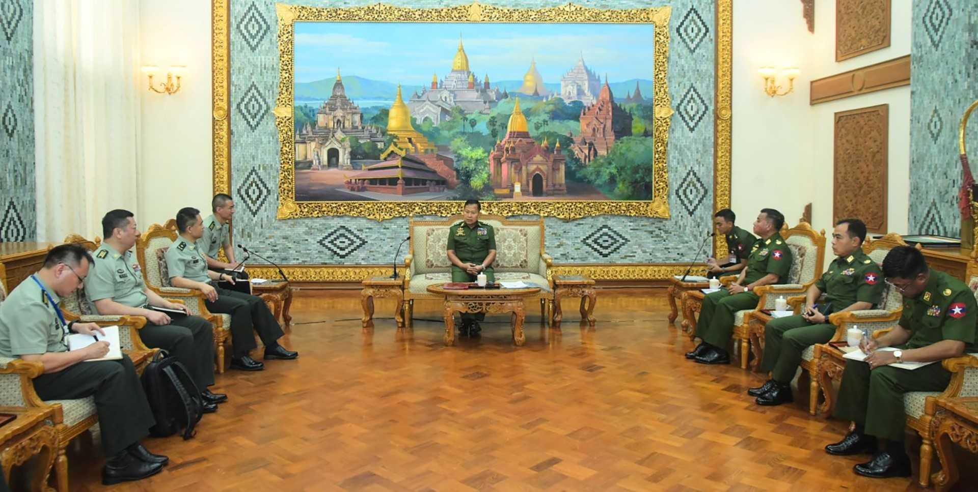 This handout photograph taken on May 30 and released on May 31 shows Myanmar's Vice-Senior General Soe Win (centre) receiving a delegation (left) led by Major-General Yang Yang, Acting Director-General of the Intelligence Bureau of the Joint Staff Department of the Central Military Commission of China, during a meeting in Naypyidaw. Photo: AFP