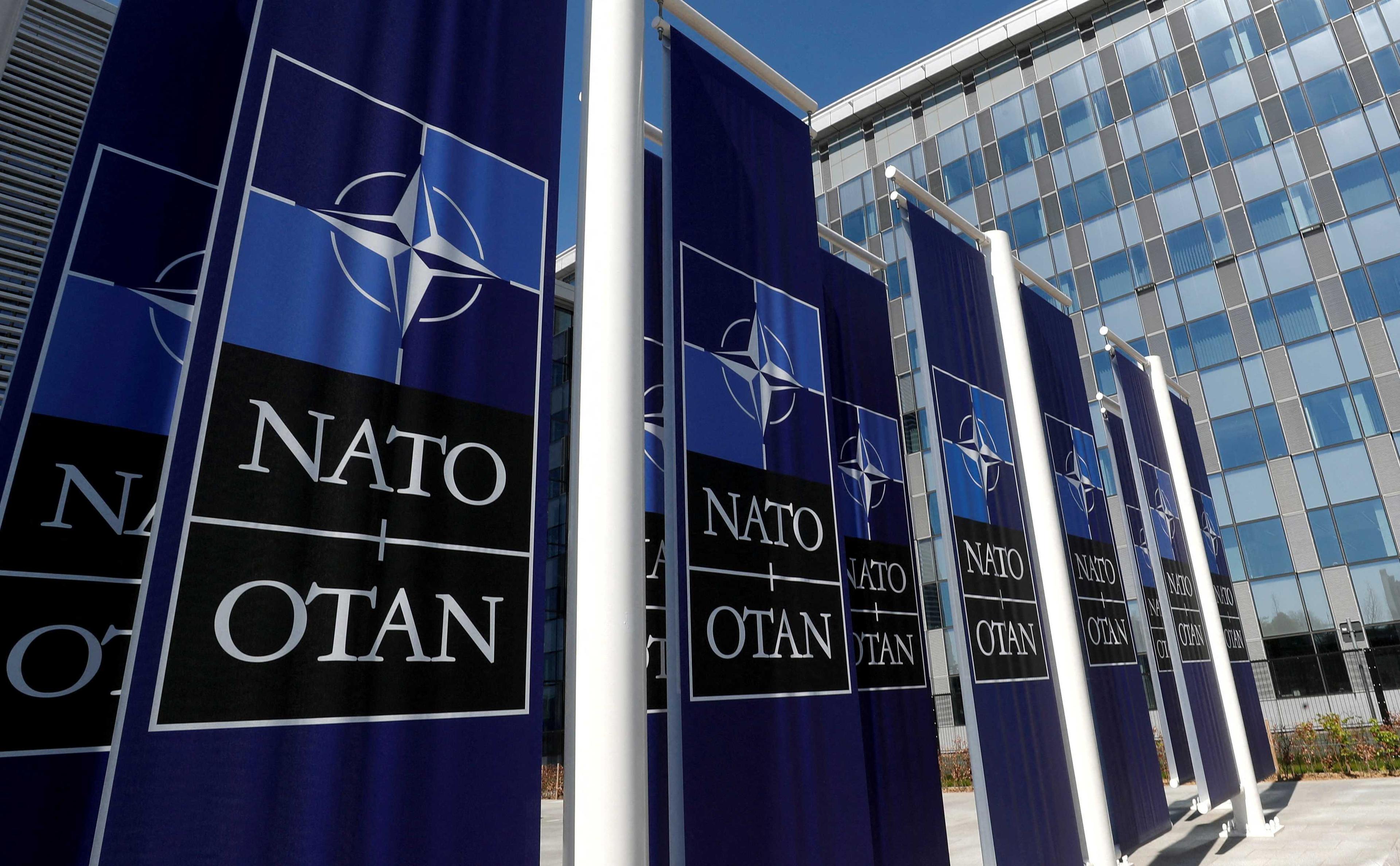 Banners displaying the Nato logo are placed at the entrance of new Nato headquarters during the move to the new building, in Brussels, Belgium April 19, 2018. Photo: Reuters