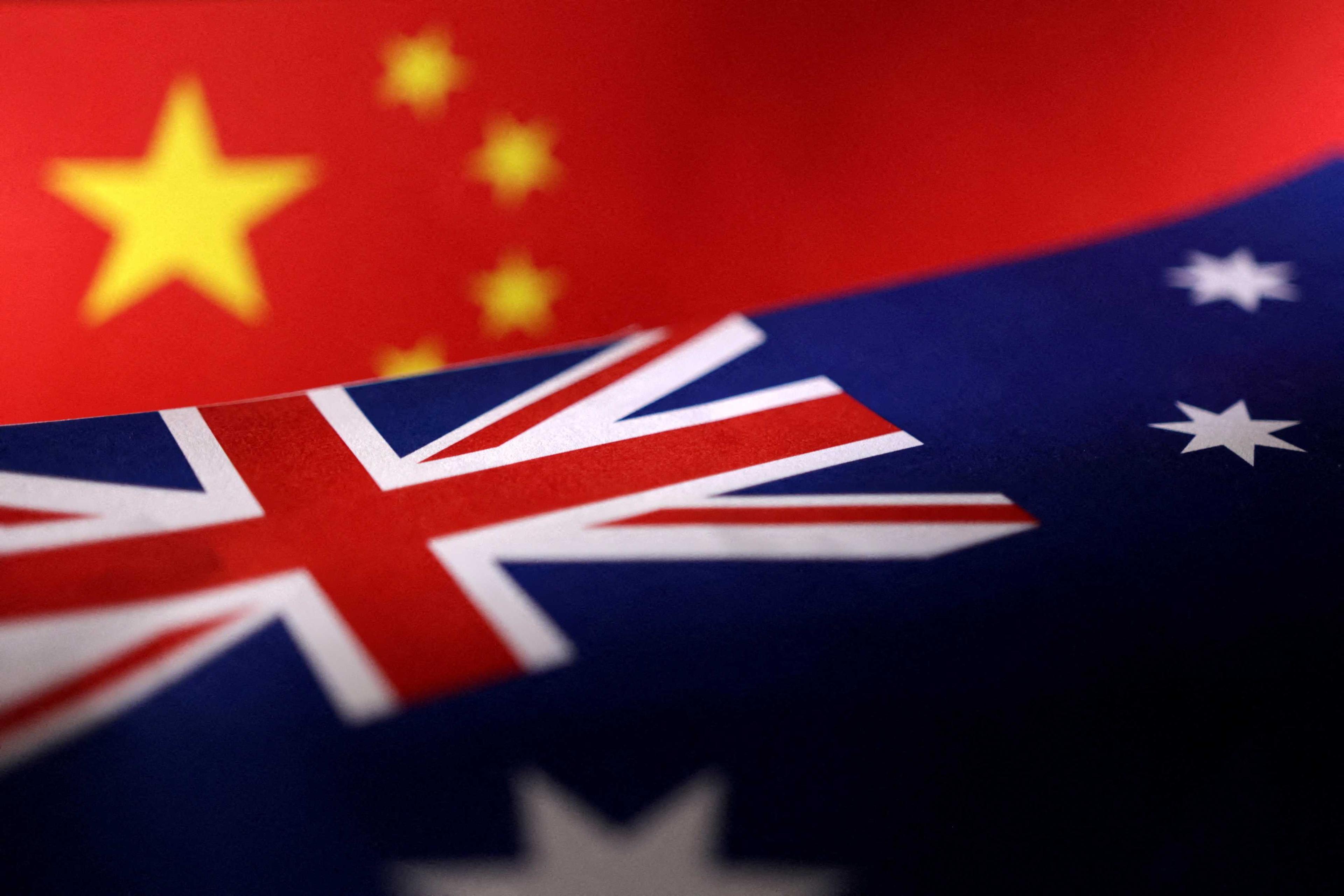 Printed Chinese and Australian flags are seen in this illustration, July 21, 2022. Photo: Reuters