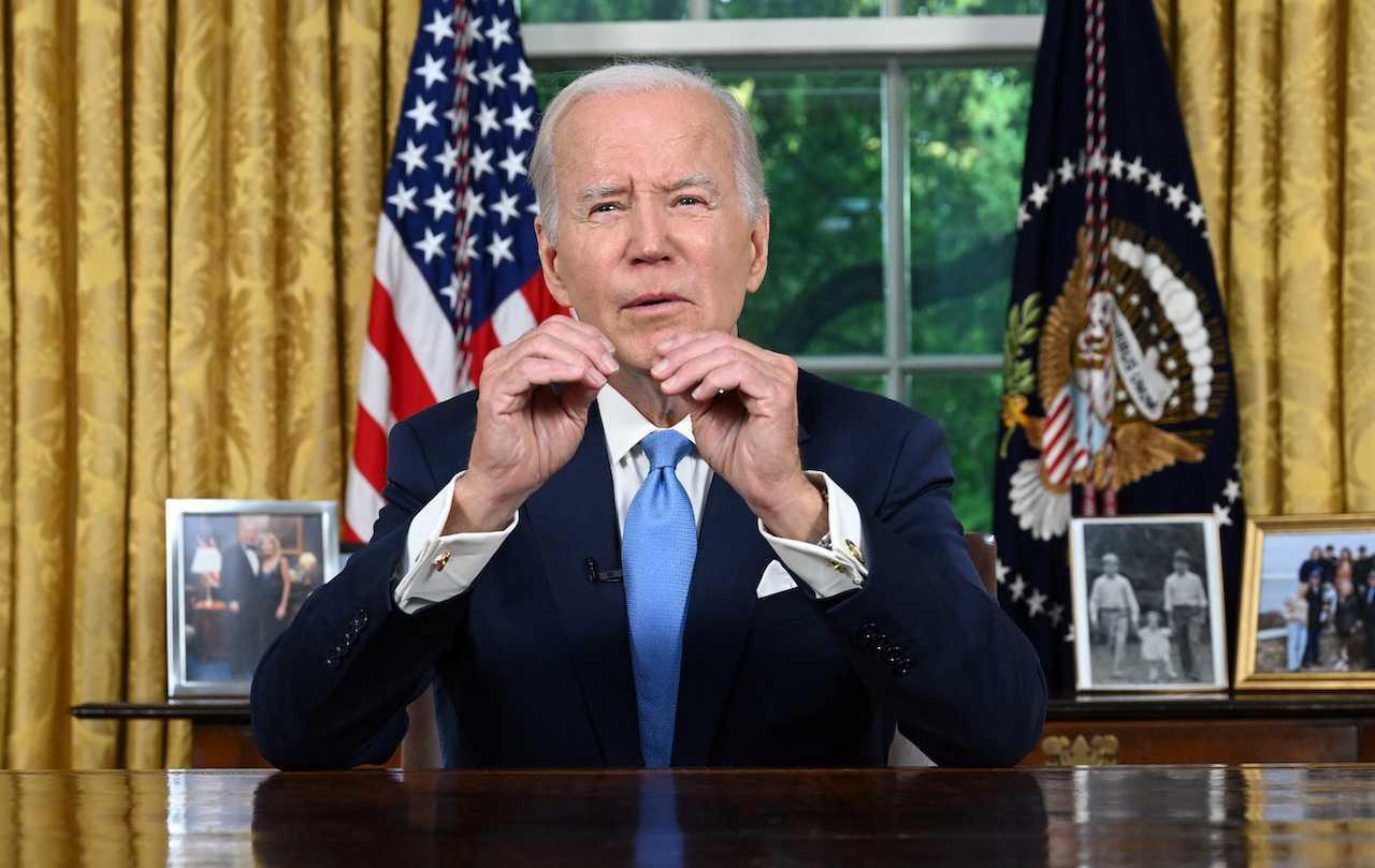 US President Joe Biden addresses the nation on averting default and the bipartisan budget agreement, in the Oval Office of the White House in Washington, DC, June 2. Photo: Reuters