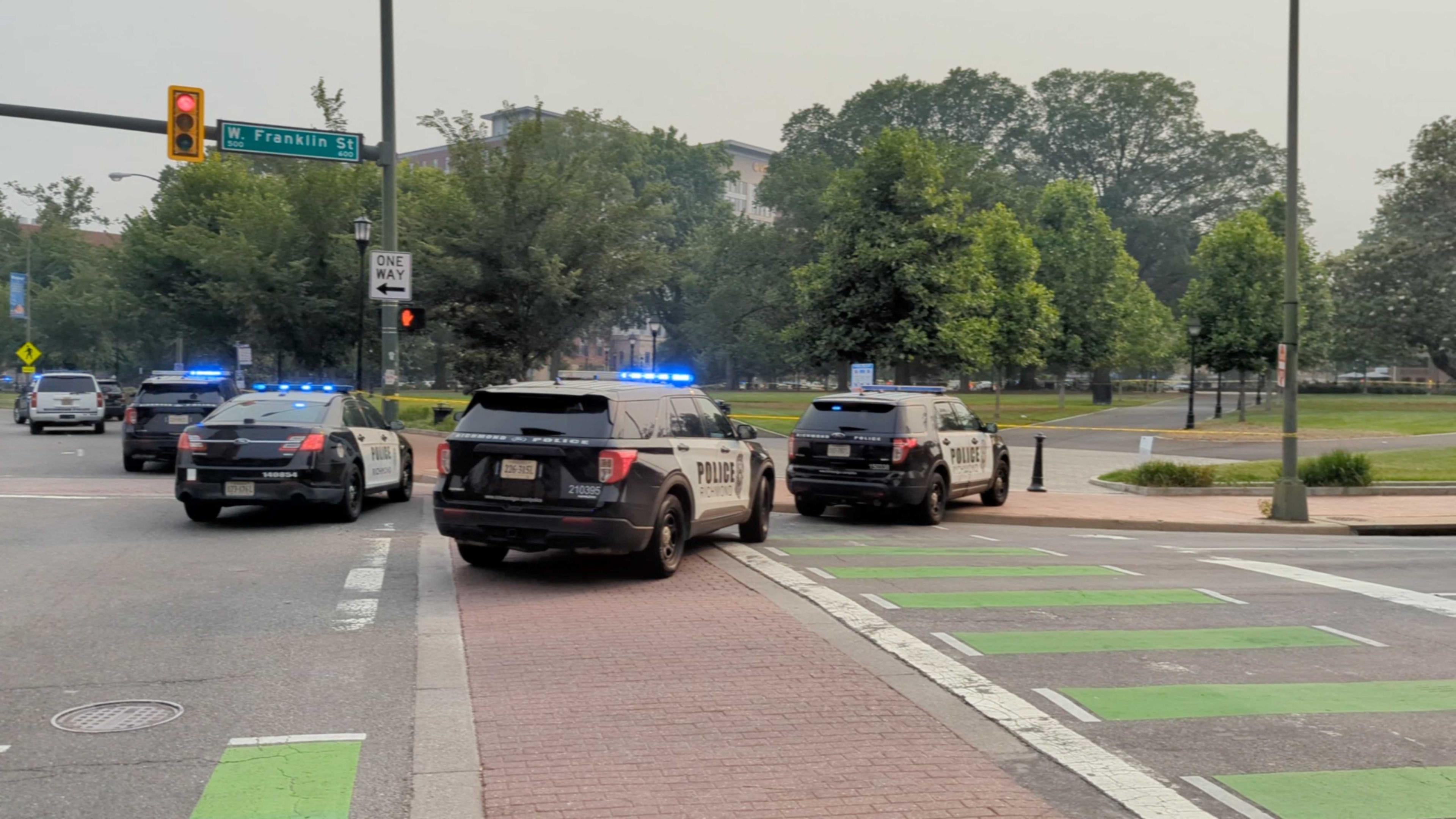 Police vehicles are seen parked near a park where, according to the police, a gunman opened fire, in Richmond, Virginia US, June 6. Photo: Reuters