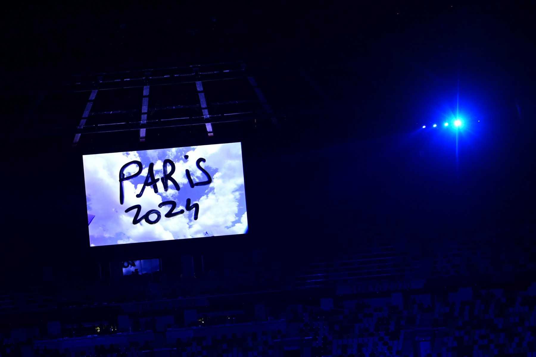 A video announcing the Paris 2024 Olympics Game is seen during the closing ceremony of the Tokyo 2020 Olympic Games, at the Olympic Stadium, in Tokyo, on Aug 8, 2021. Photo: AFP