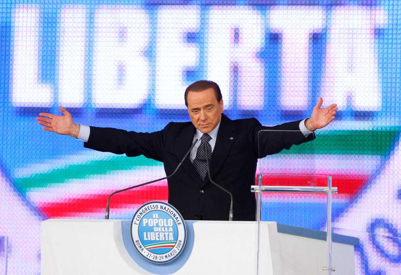 Then Italy Prime Minister Silvio Berlusconi speaks at the opening of his People of Freedom bloc congress in Rome, Italy, March 27, 2009. Photo: Reuters
