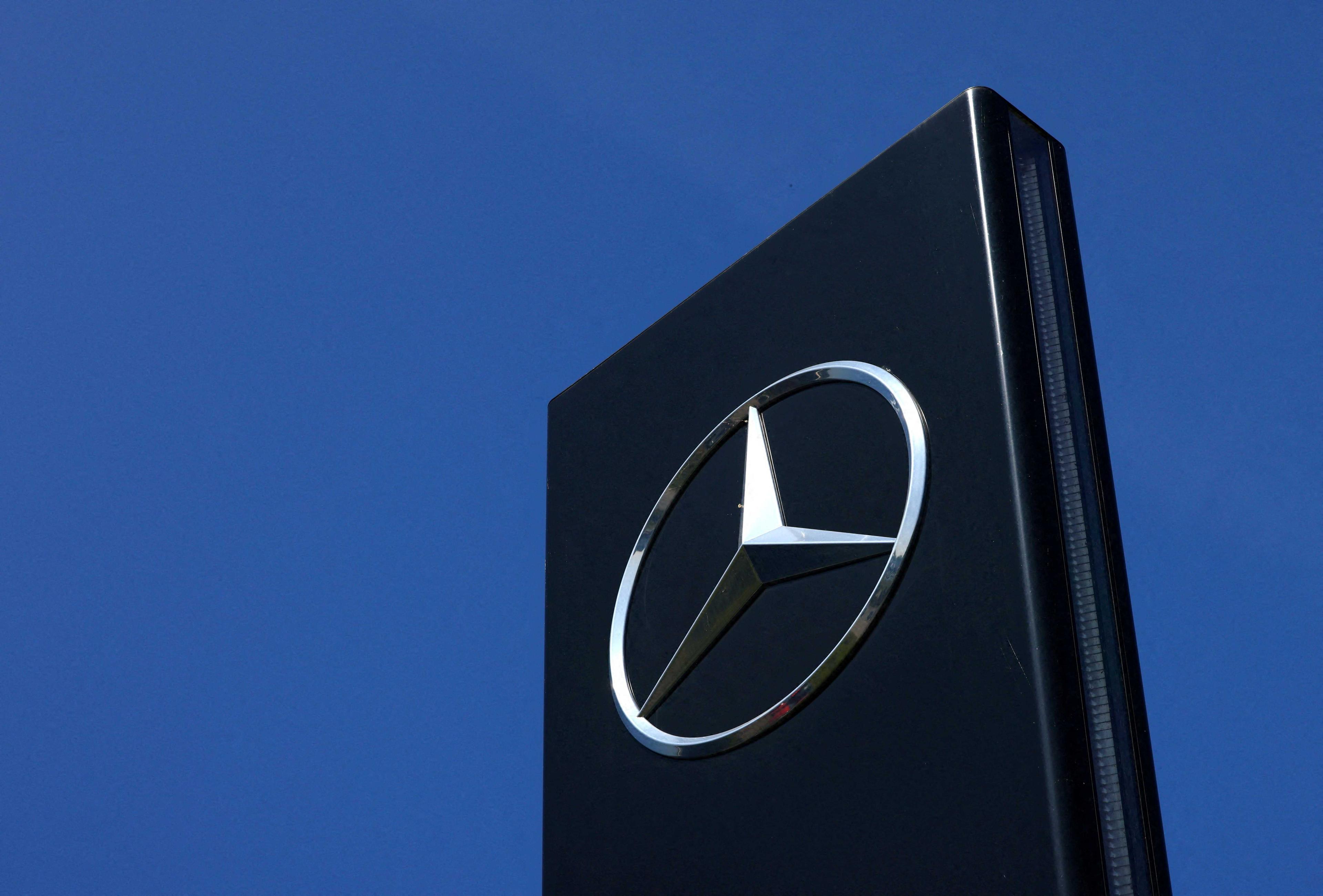 The logo of Mercedes-Benz is seen outside a Mercedes-Benz car dealer in Brussels, Belgium June 1. Photo: Reuters