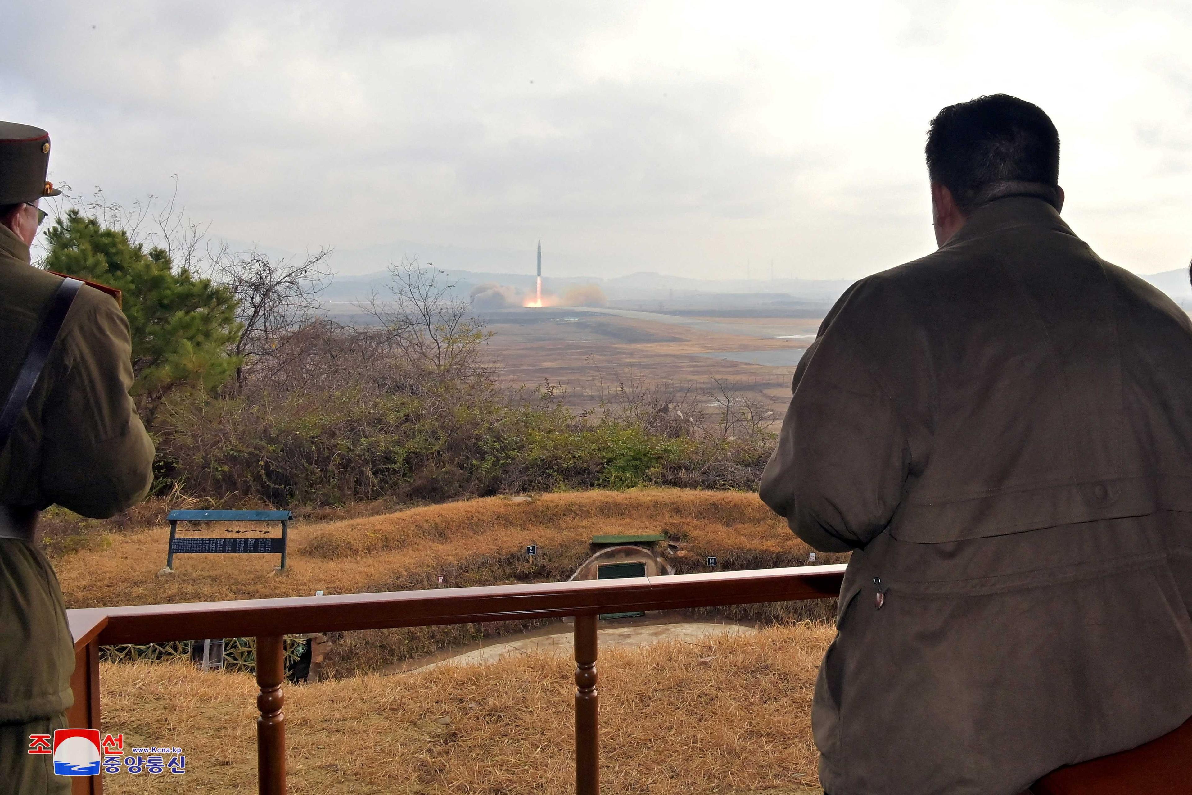 North Korean leader Kim Jong Un watches the launch of an intercontinental ballistic missile in this undated photo released on Nov 19, 2022. Photo: Reuters