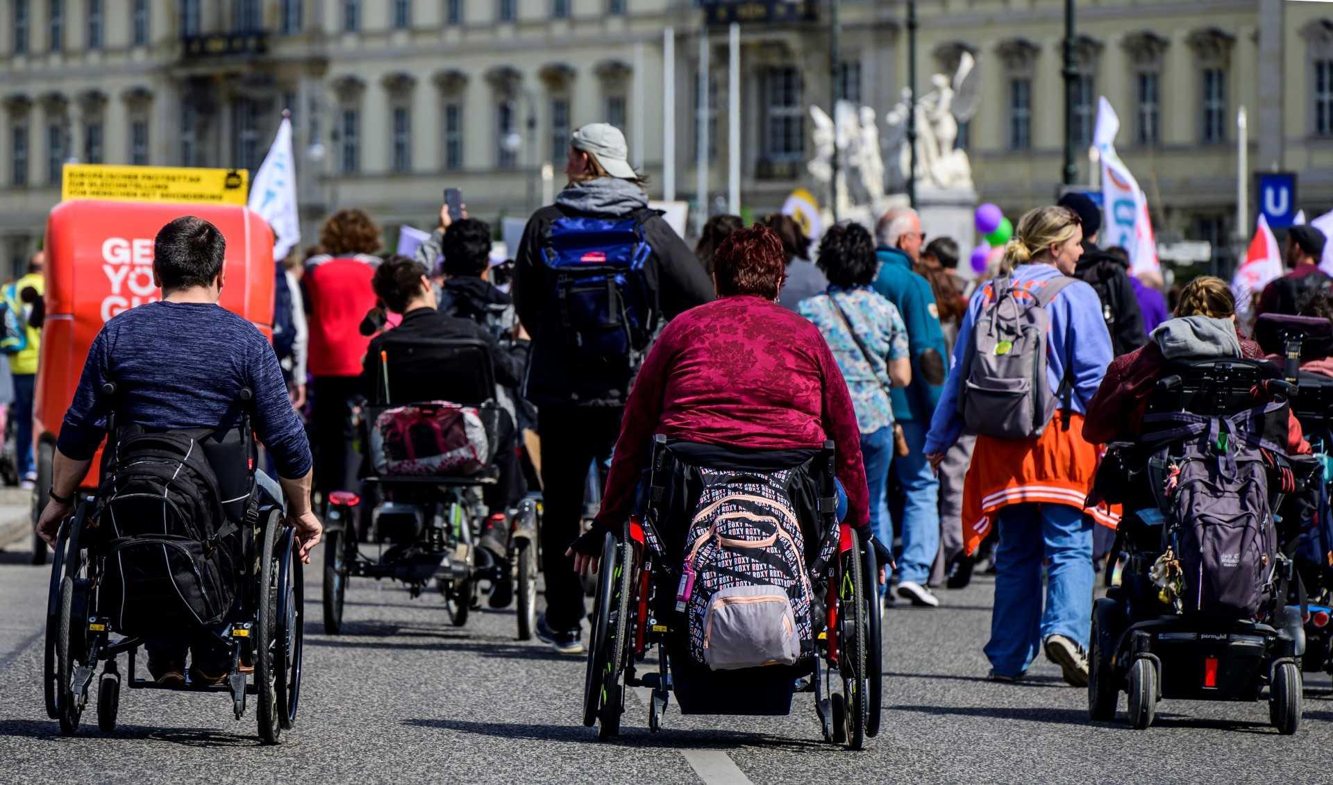 People in wheelchairs take part in a rally in Berlin on May 5. Photo: AFP