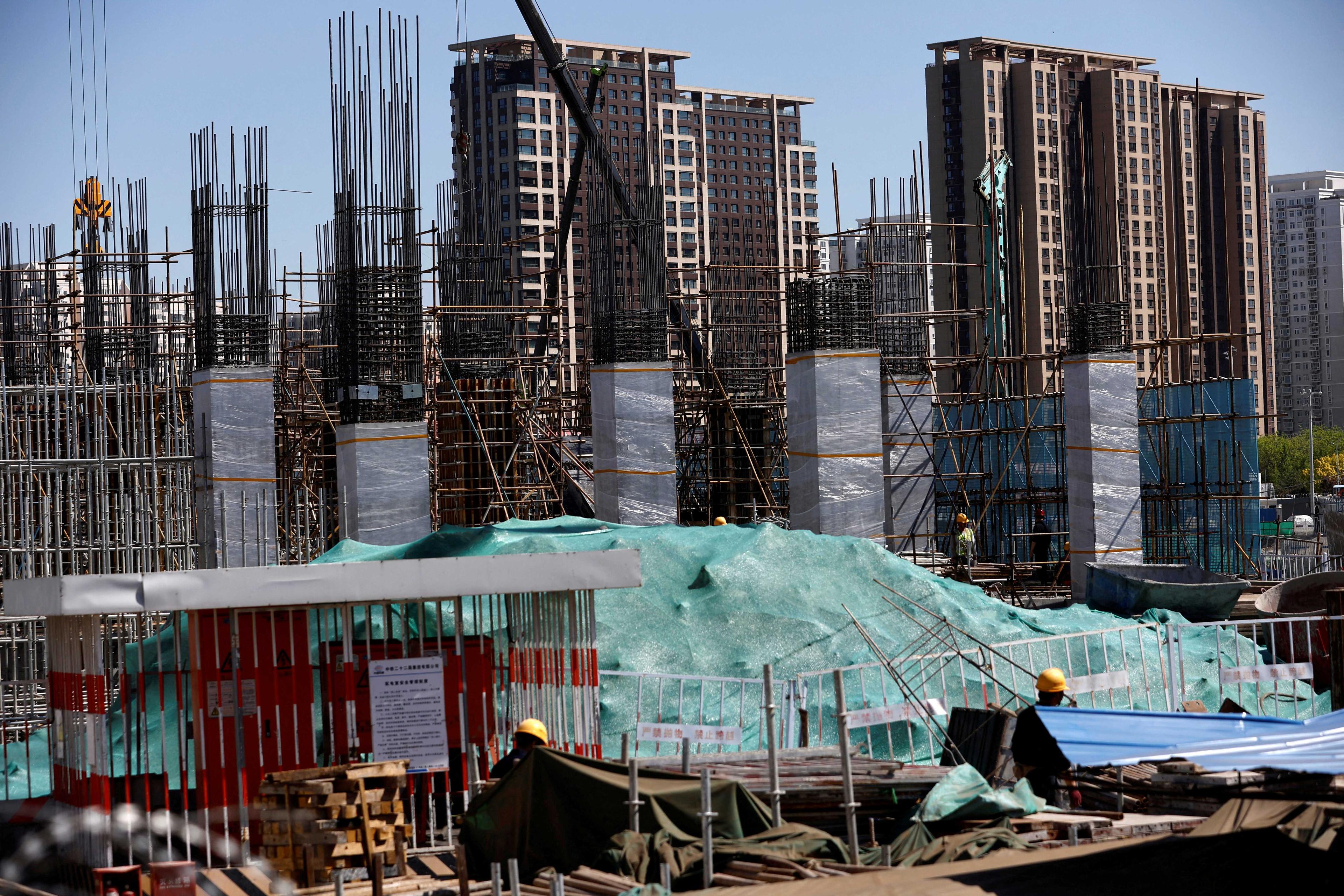 Workers work at a construction site of a subway station in Beijing, China April 18. Photo: Reuters