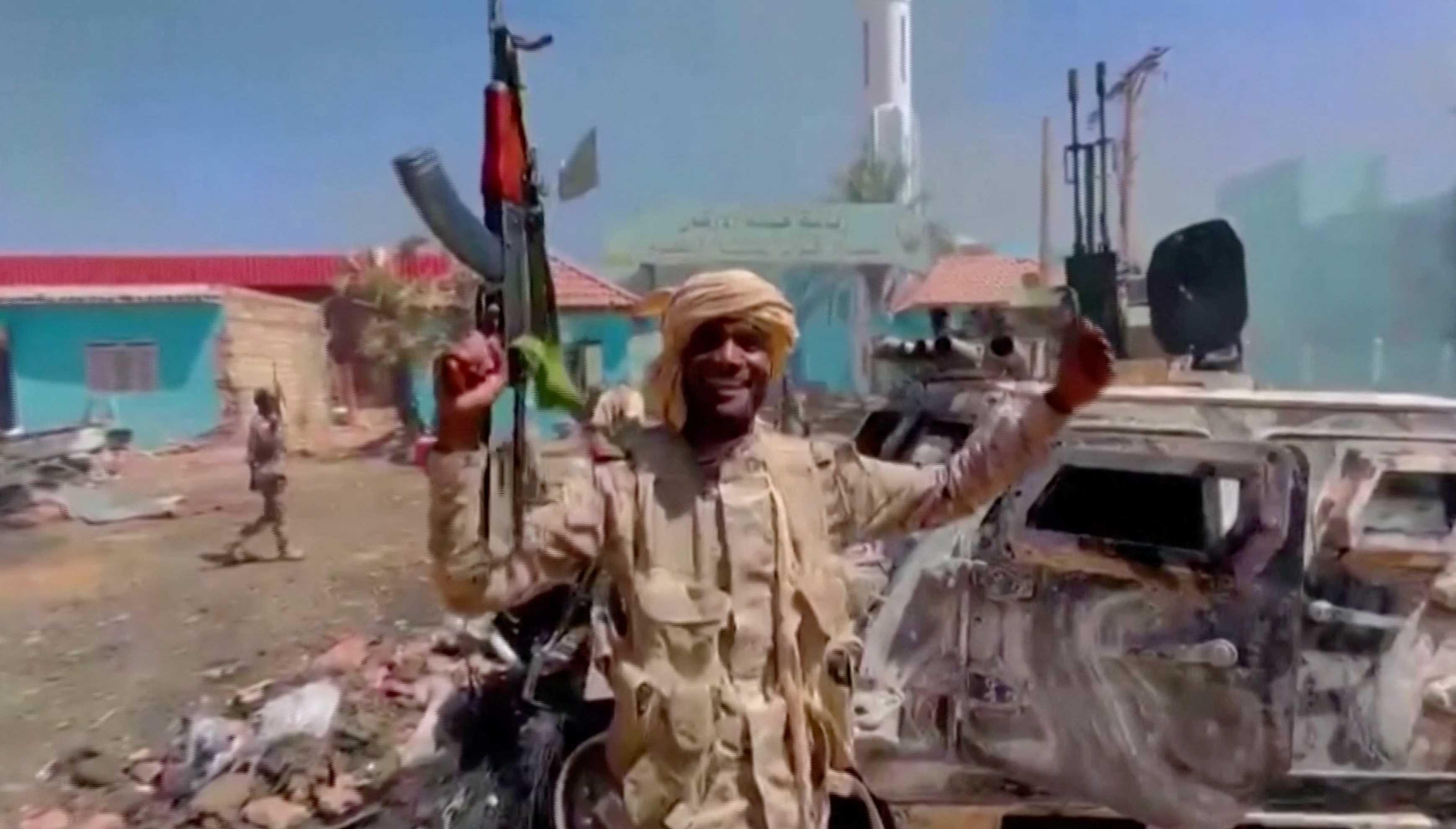 A member of the RSF forces walks around the destroyed Air Defence Forces command site in Khartoum, Sudan, in this screengrab obtained from a social media video on June 14. Photo: Reuters
