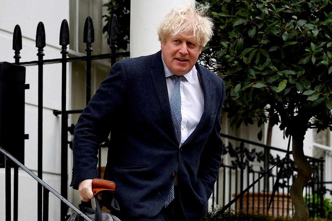 Former British prime minister Boris Johnson leaves his home, in London, Britain, March 21. Photo: Reuters